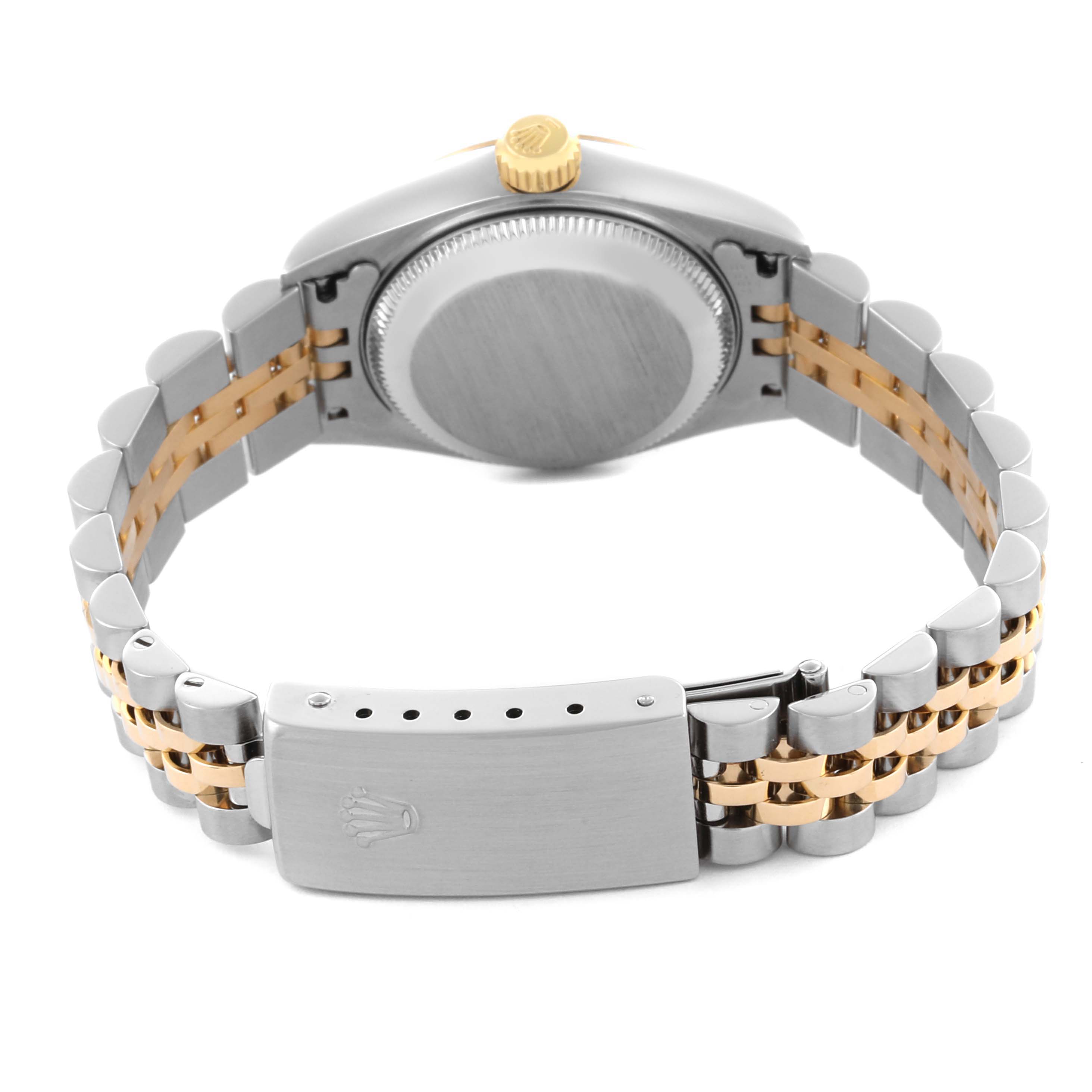 The image shows the back view of a Rolex Datejust 79173 Women
s Steel and Gold (two tone) Champagne Dial 79173 Women
s Steel and Gold (two tone) Champagne Dial, focusing on the case back, crown, and two-tone bracelet with clasp.