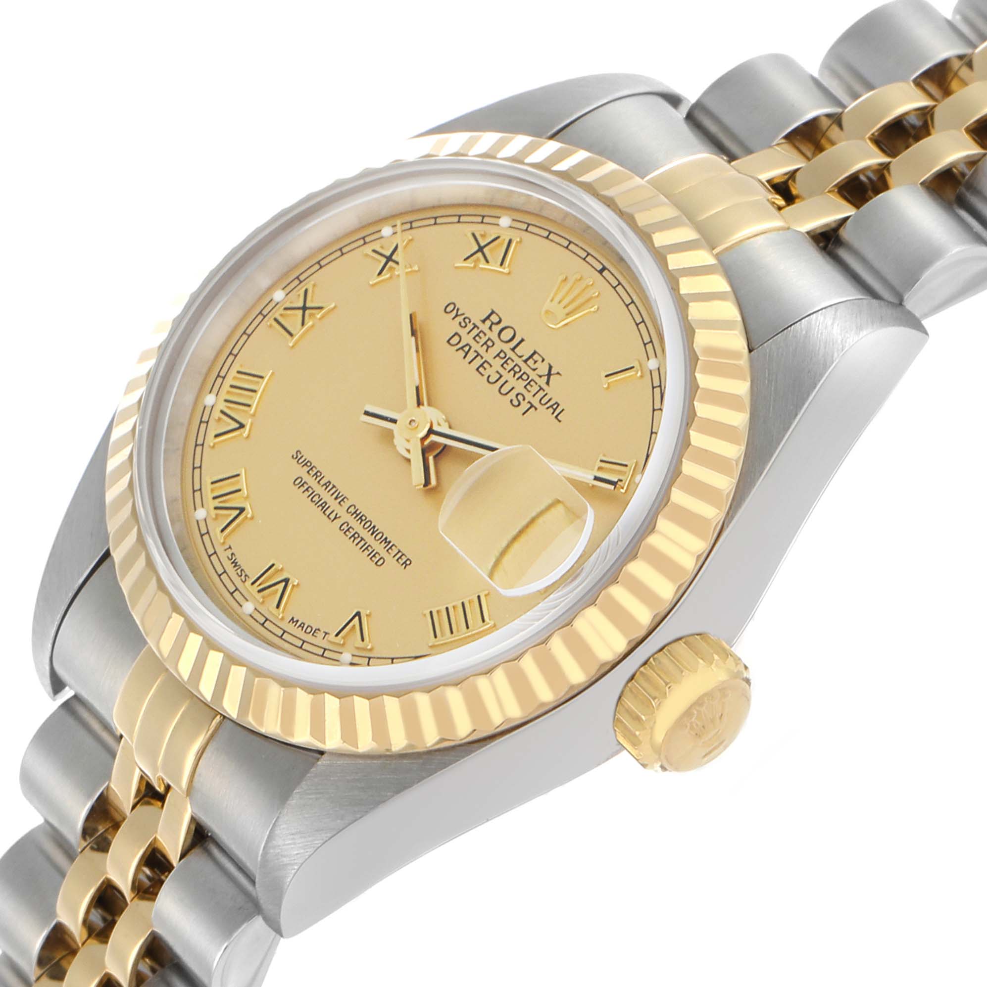 The Rolex Datejust 69173 Women's Steel and Gold (two tone) Champagne Dial is shown at a slight angle, displaying its dial, fluted bezel, crown, and part of the bracelet.