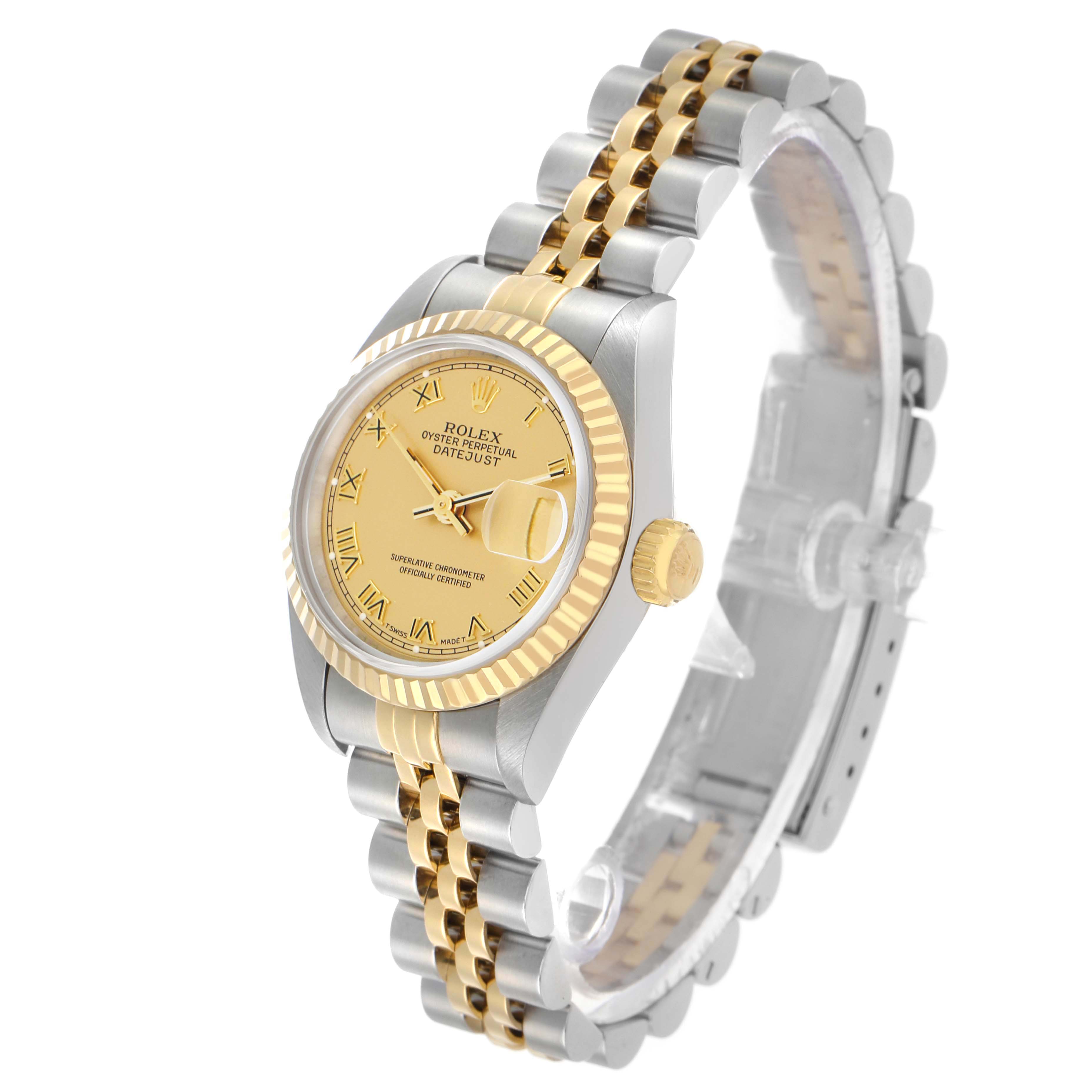 The Rolex Datejust 69173 Women's Steel and Gold (two tone) Champagne Dial watch is angled to show the gold and silver bracelet, gold bezel, dial, and side crown.
