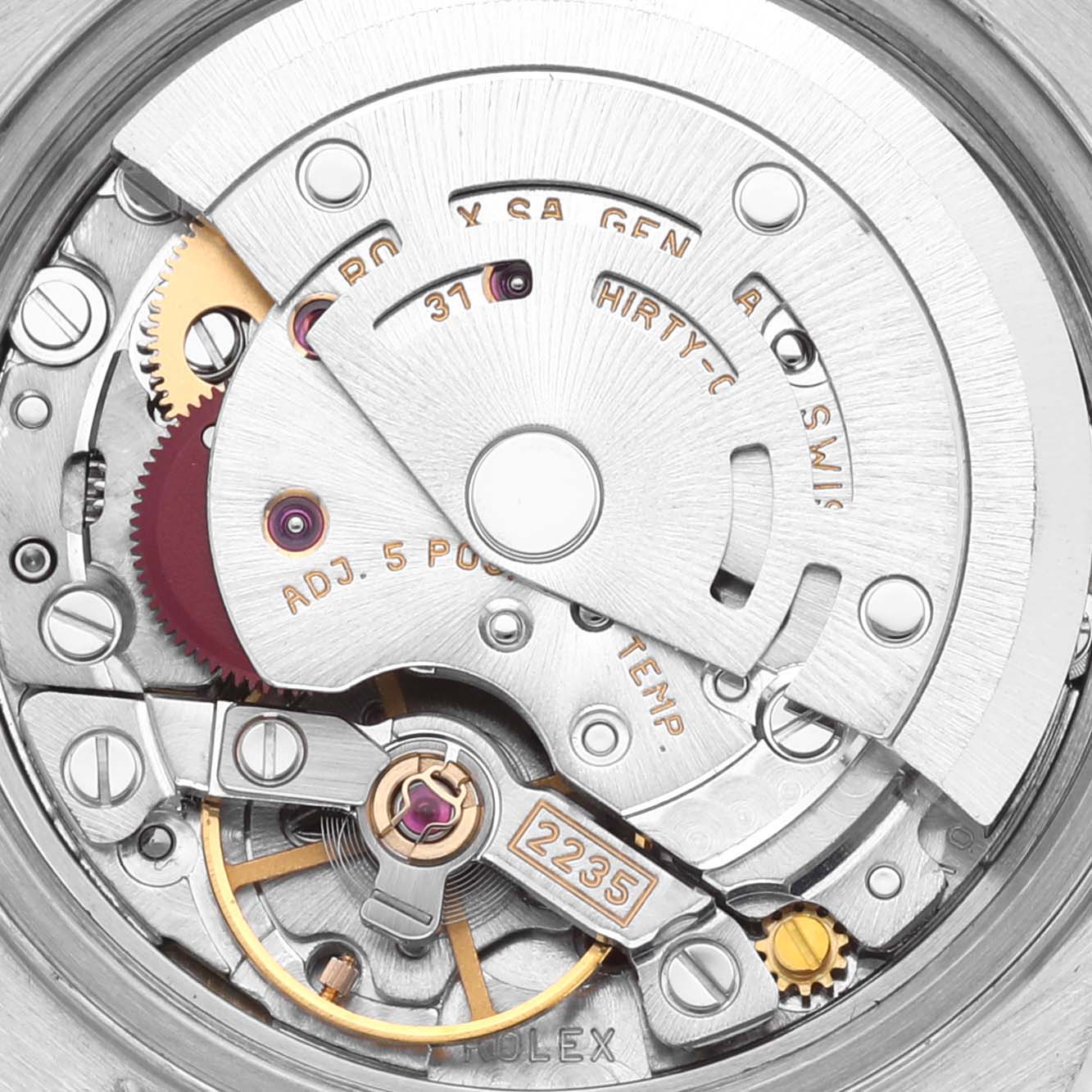 This image shows the intricate movement mechanism of the Rolex Datejust 79163 Women's Steel and Gold (two tone) Silver Dial 79163 Women's Steel and Gold (two tone) Silver Dial watch from a close-up, top-down angle.