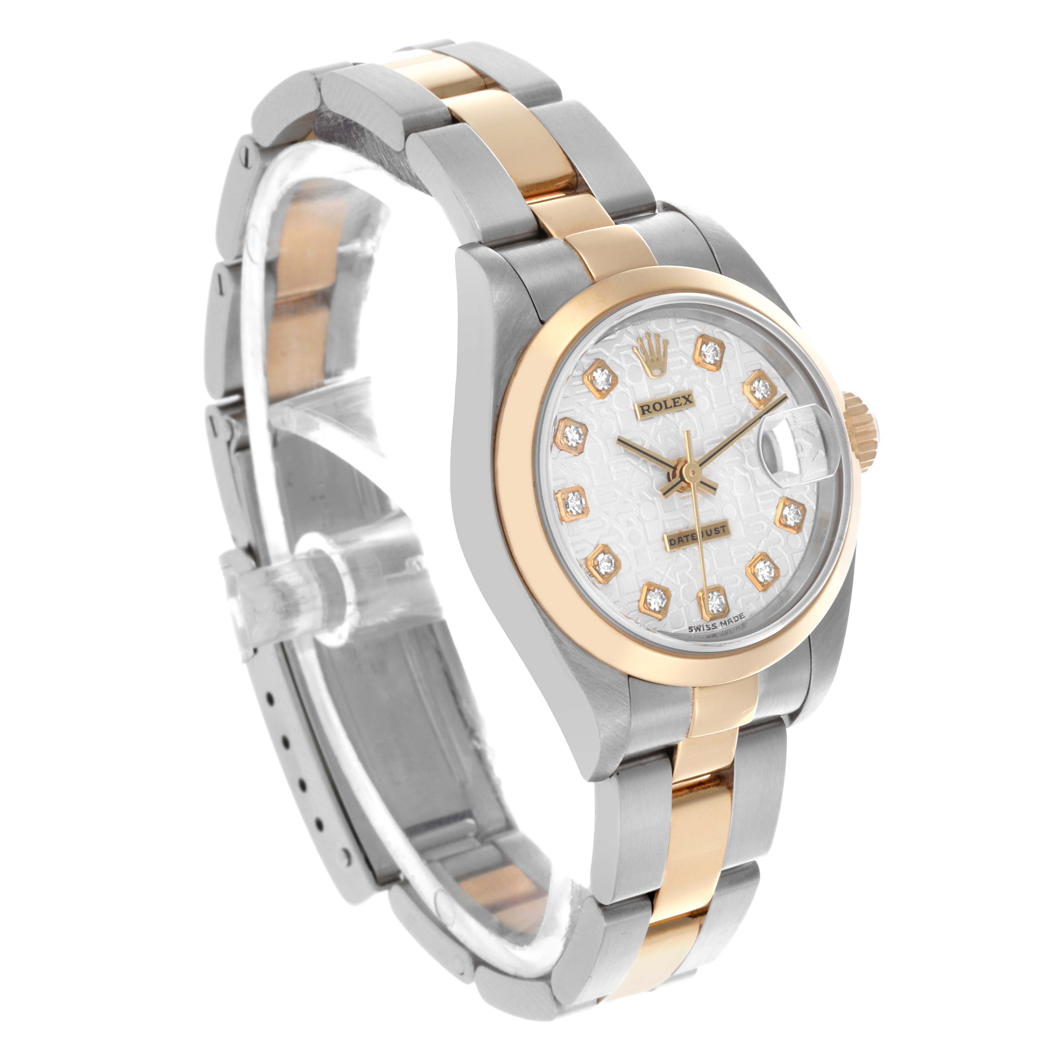The Rolex Datejust 79163 Women's Steel and Gold (two tone) Silver Dial 79163 Women's Steel and Gold (two tone) Silver Dial watch is shown at a three-quarter angle, displaying the dial, bezel, and part of the bracelet.