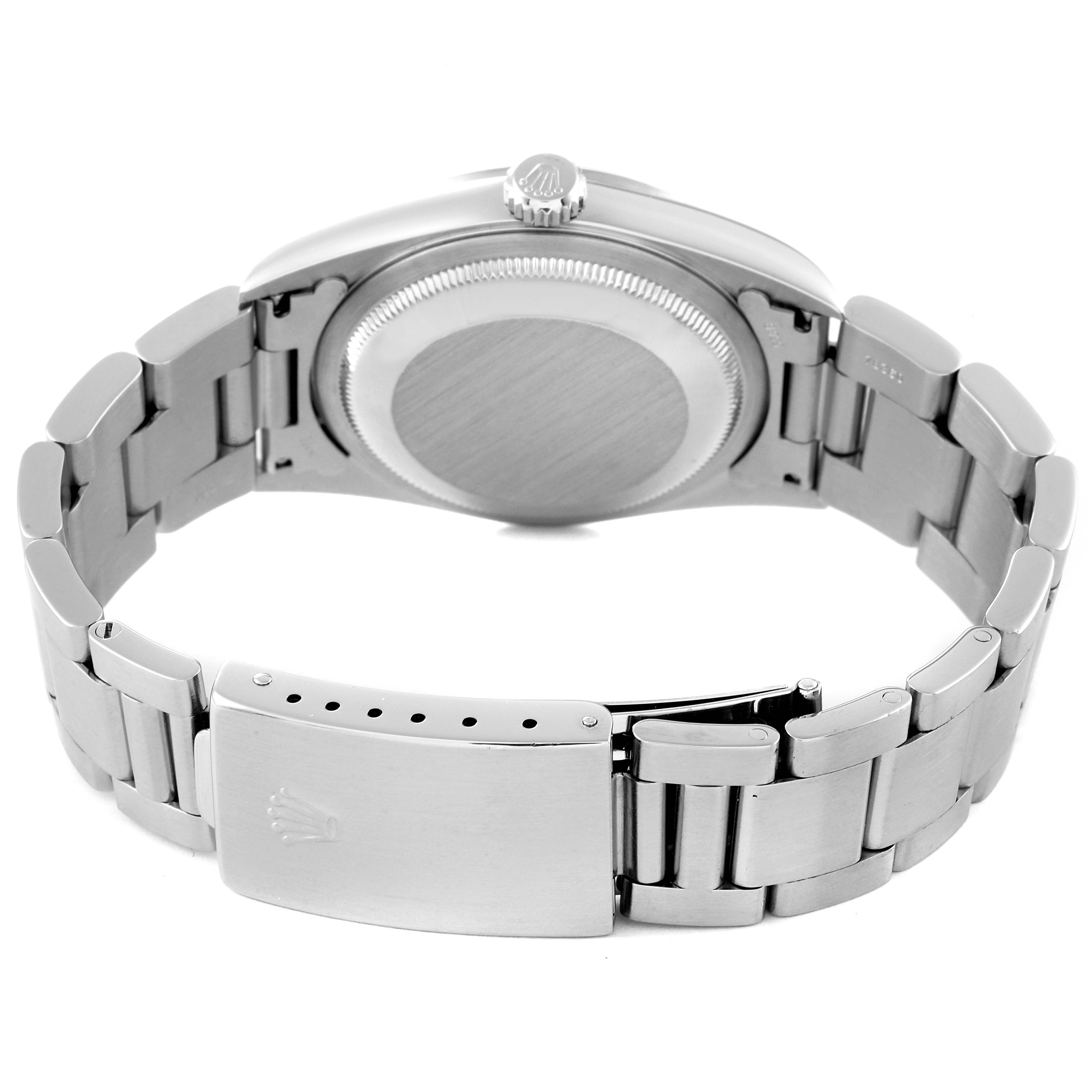 The image shows the back view of a Rolex Datejust 16200 Men's Stainless Steel White Dial 16200 Men's Stainless Steel White Dial watch, including its closed clasp, bracelet, and case back.