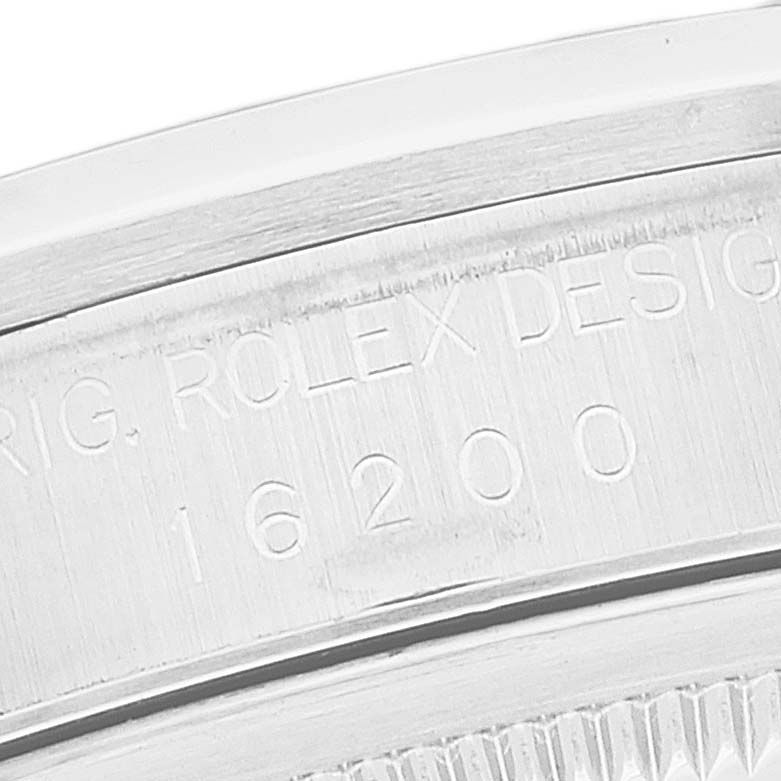 This close-up image shows the model number engraved on the case of a Rolex Datejust 16200 Men's Stainless Steel White Dial 16200 Men's Stainless Steel White Dial watch.