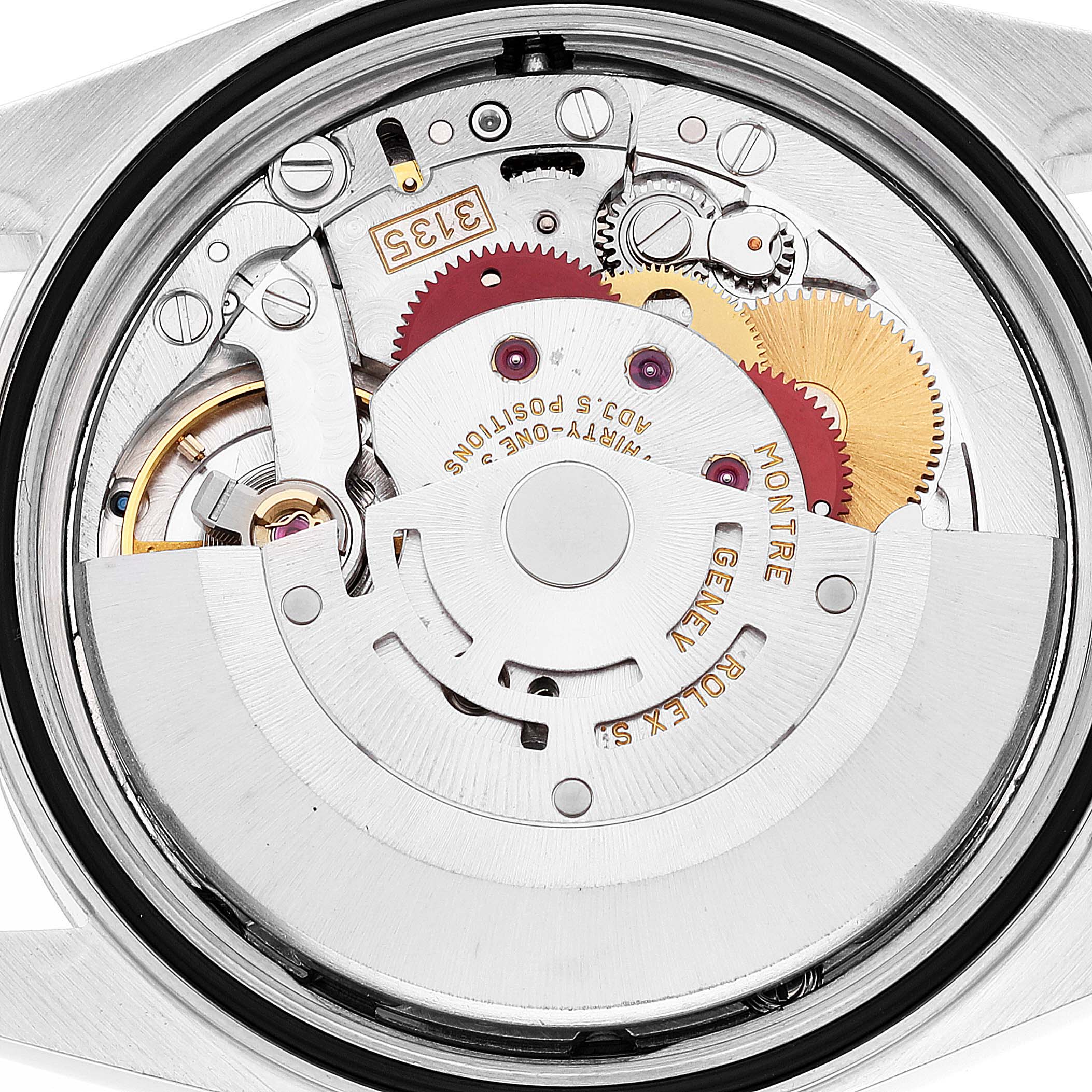 This image shows the internal mechanism and gears of a Rolex Datejust 16200 Men's Stainless Steel White Dial 16200 Men's Stainless Steel White Dial watch viewed from the back.