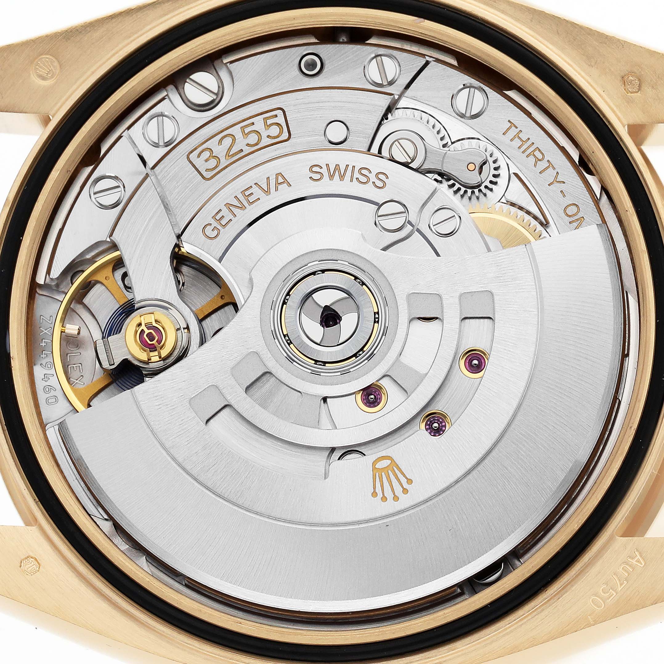The image shows the movement of a Rolex President 128238 Men's Yellow Gold Champagne Dial model, highlighting the intricate mechanics and rotor from the back.