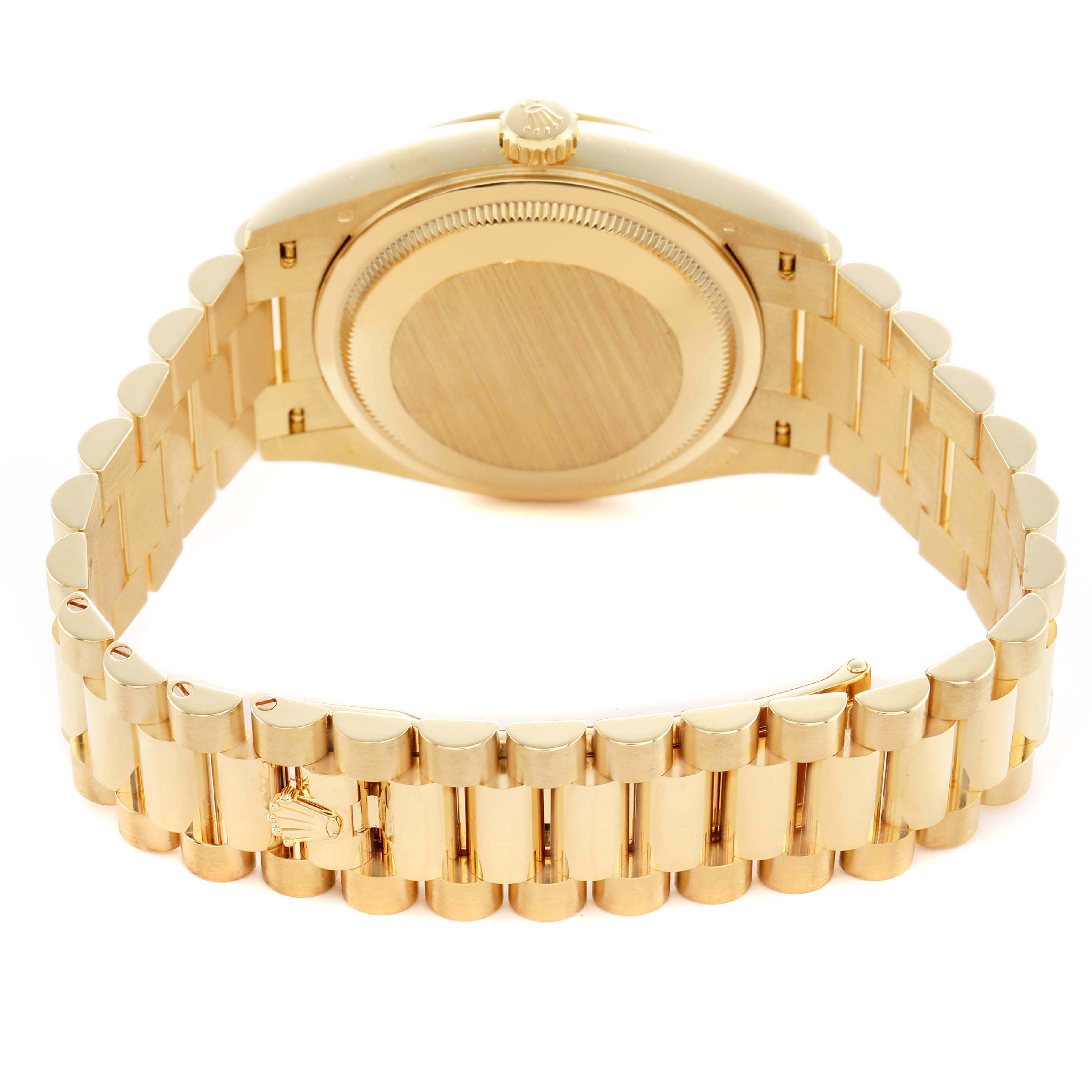 The image shows the back view of a Rolex President 128238 Men's Yellow Gold Champagne Dial model, highlighting the case, bracelet, and clasp.