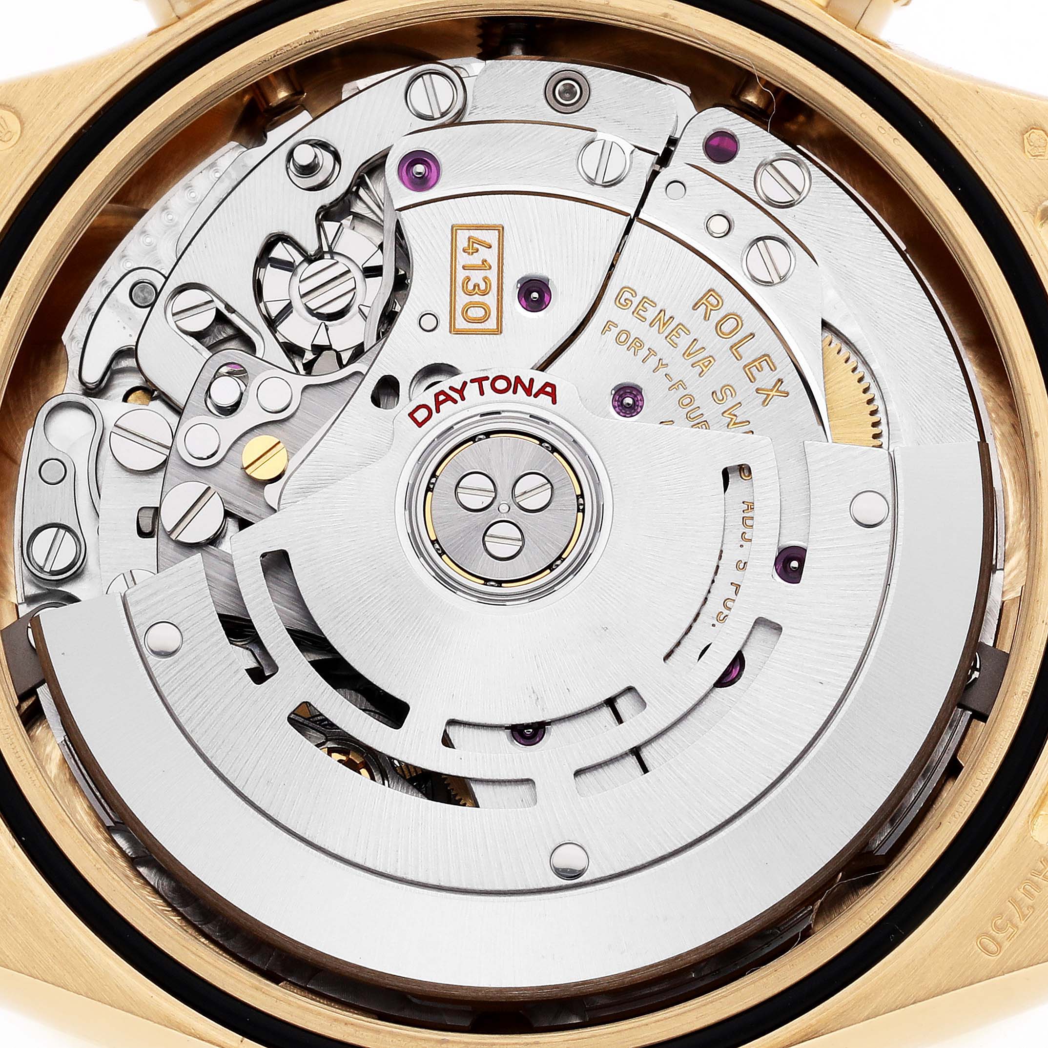 The image shows the movement of a Rolex Daytona 116508 Men's Yellow Gold Black Dial watch from a top-down angle, highlighting the intricate mechanics and rotor.