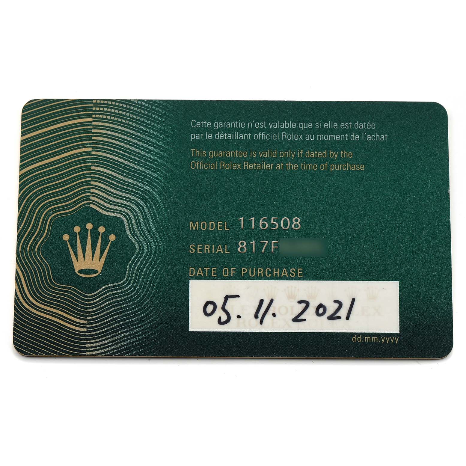 The image shows a guarantee card for a Rolex Daytona 116508 Men's Yellow Gold Black Dial model, detailing the model and serial number.