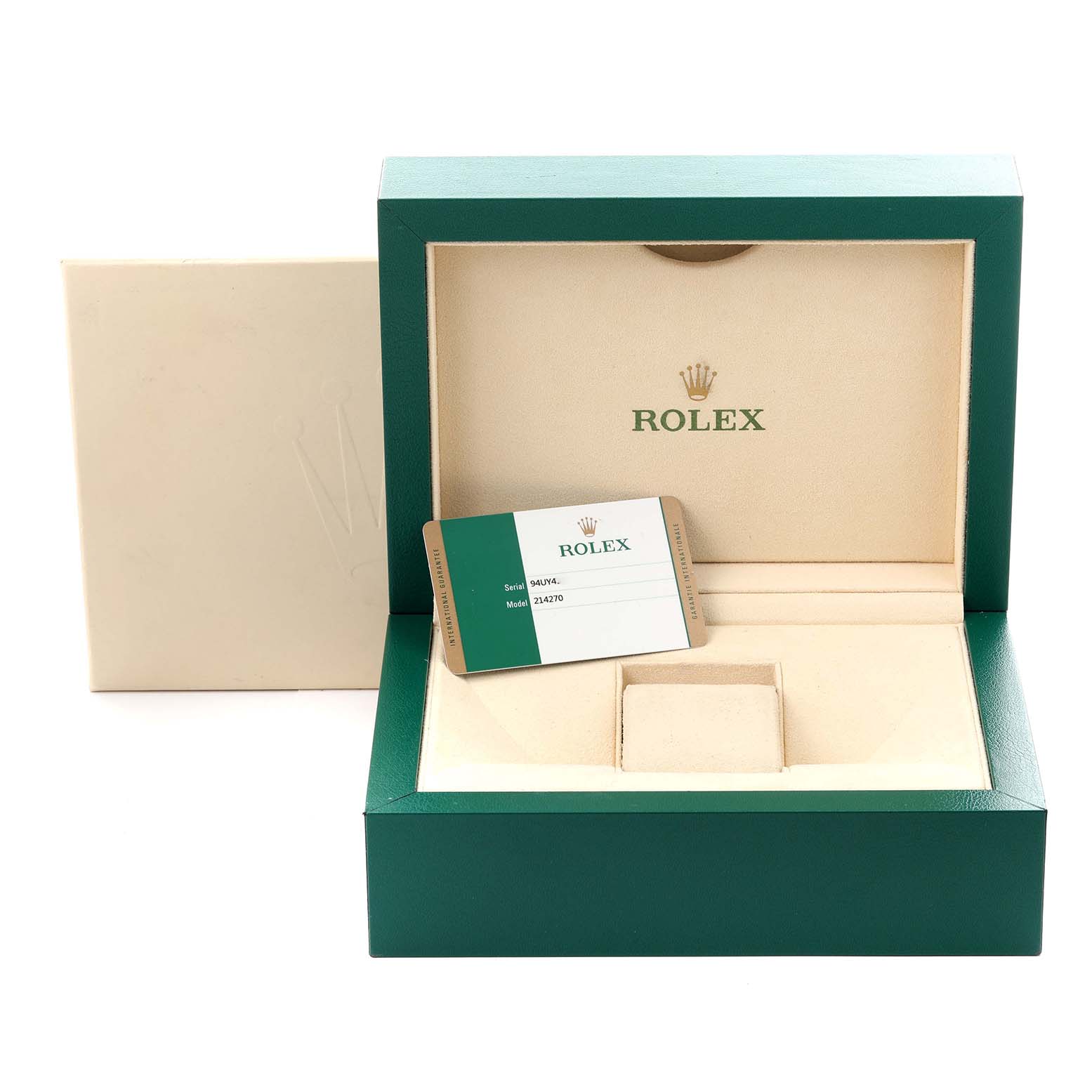 The image shows a green and beige Rolex Explorer 214270 Men
s Stainless Steel Black Dial 214270 Men
s Stainless Steel Black Dial watch box and a card with serial and model numbers.