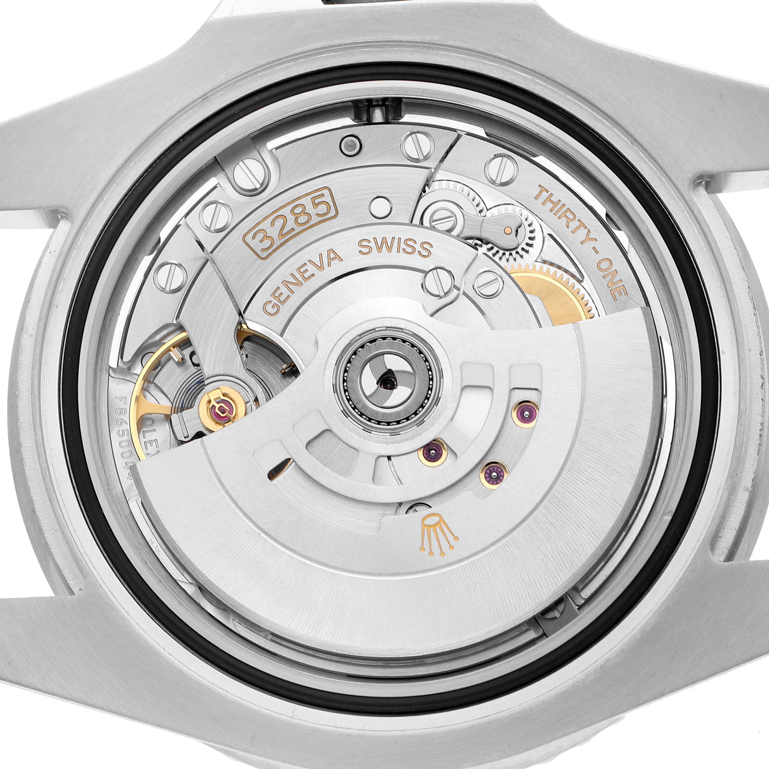 The image shows the open case back of a Rolex GMT-Master 126710 Men's Stainless Steel Black Dial, highlighting the movement and internal mechanism.