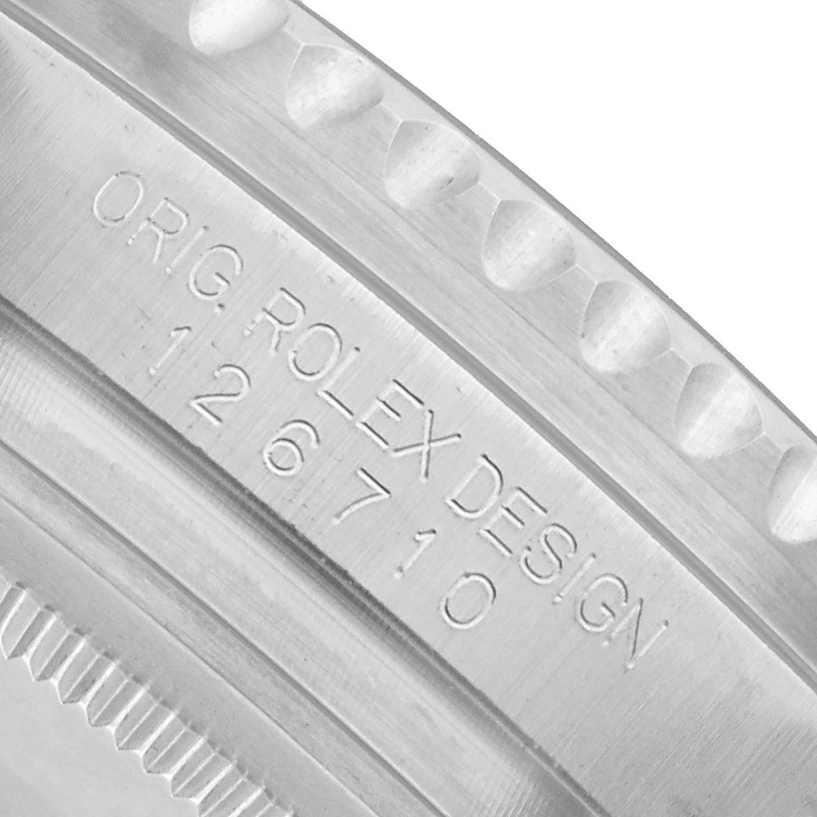 The image shows a close-up of the side engraving on the bezel of the Rolex GMT-Master 126710 Men's Stainless Steel Black Dial, displaying the model number "126710".