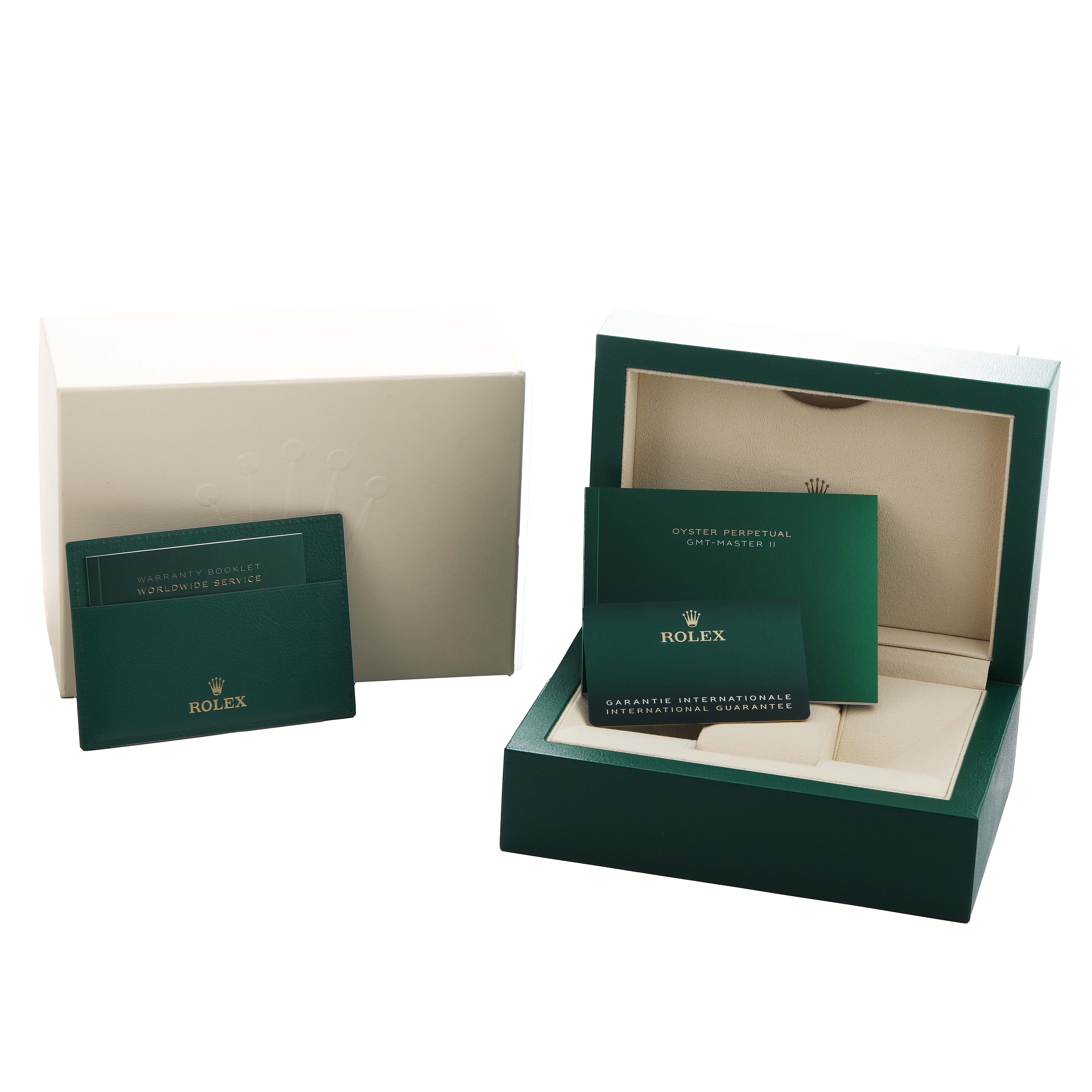 The image shows the Rolex GMT-Master 126710 Men's Stainless Steel Black Dial's box, warranty booklets, and cover from a front angle.