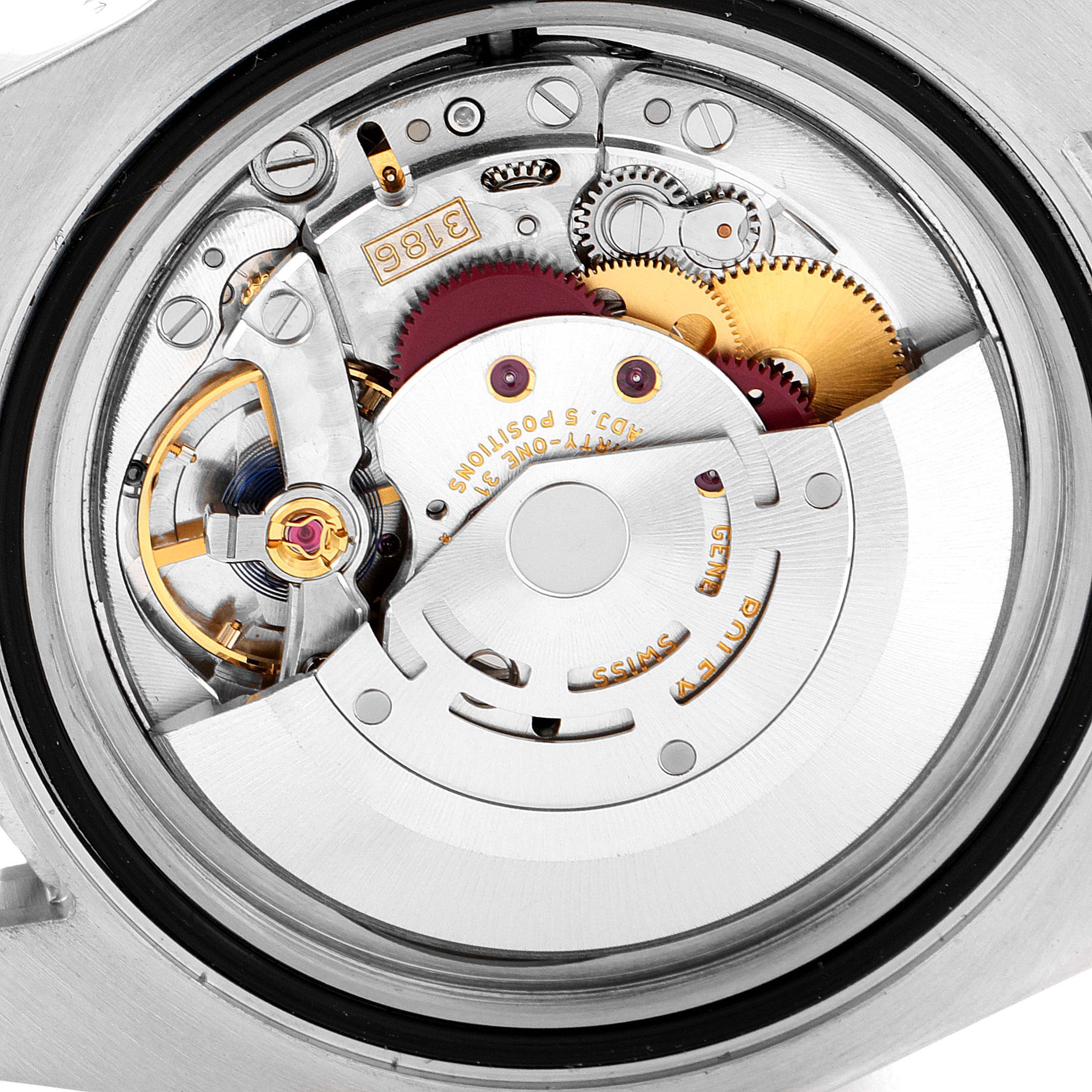 This image shows the internal mechanism and movement of the Rolex GMT-Master 116713 Men's Steel and Gold (two tone) Black Dial 116713 Men's Steel and Gold (two tone) Black Dial watch viewed from the back.