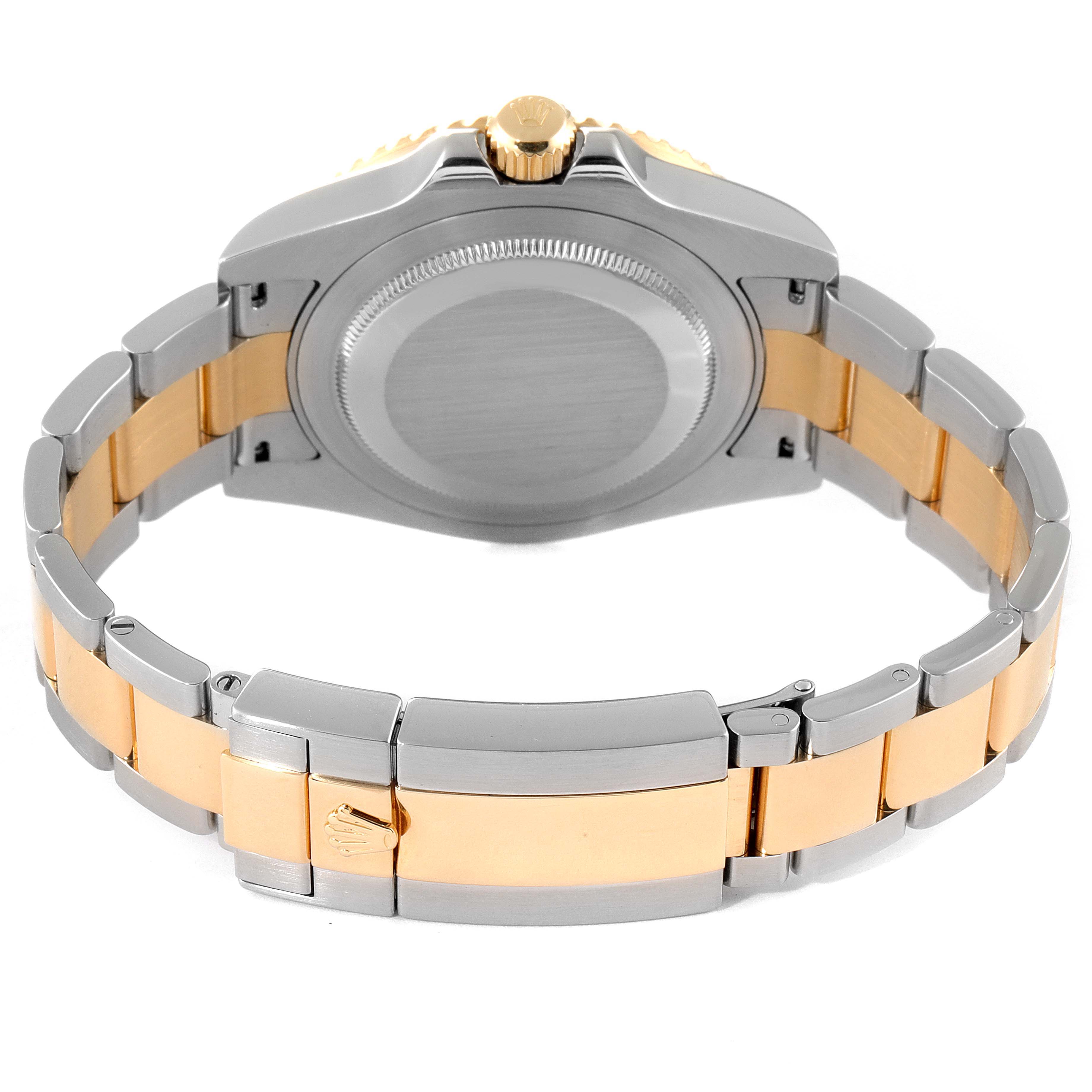 This image shows the back case and bracelet of a Rolex GMT-Master 116713 Men's Steel and Gold (two tone) Black Dial 116713 Men's Steel and Gold (two tone) Black Dial watch, viewed from the rear.