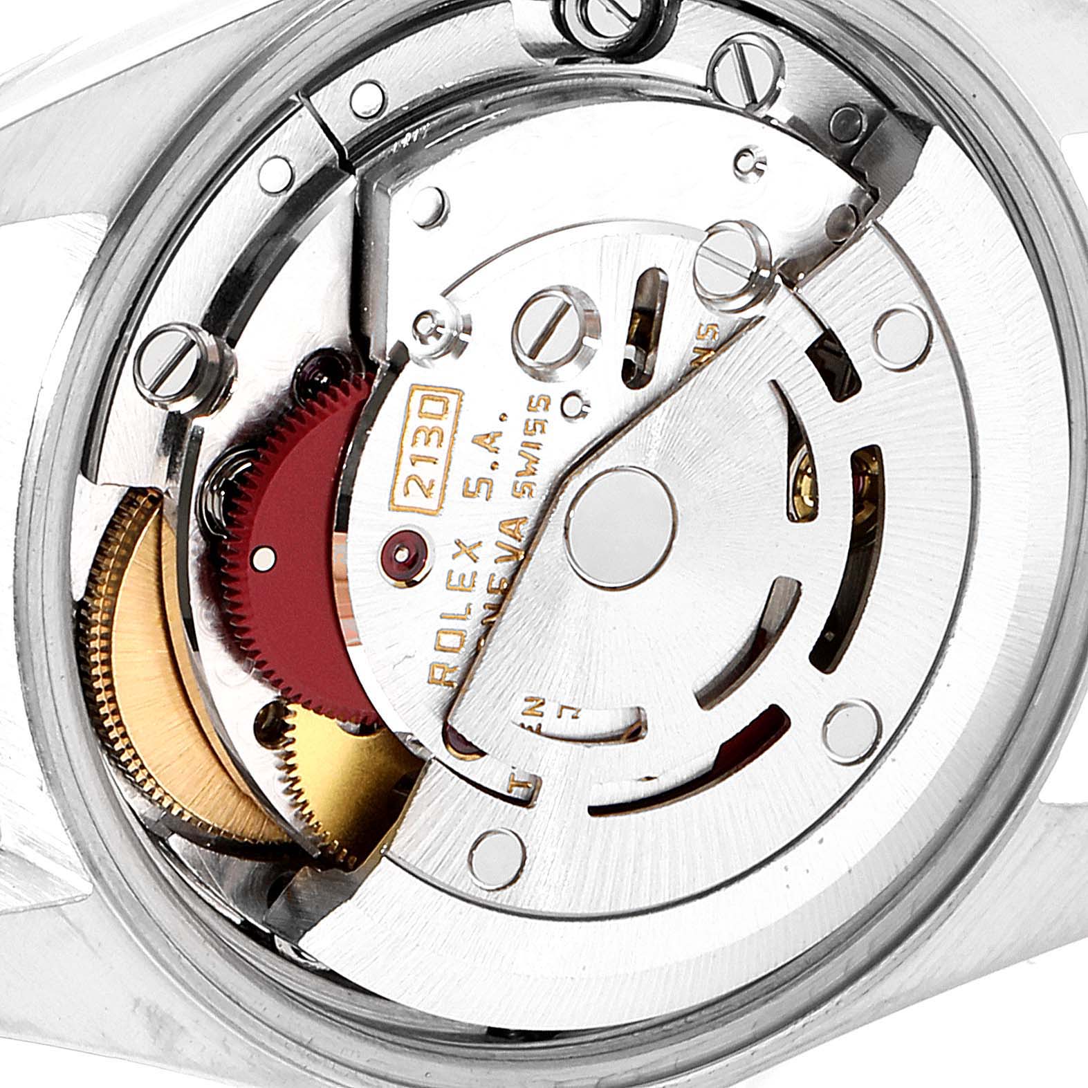 The image shows a close-up of the movement mechanism of a Rolex Oyster Perpetual 67194 Women's Stainless Steel Silver Dial 67194 Women's Stainless Steel Silver Dial watch.