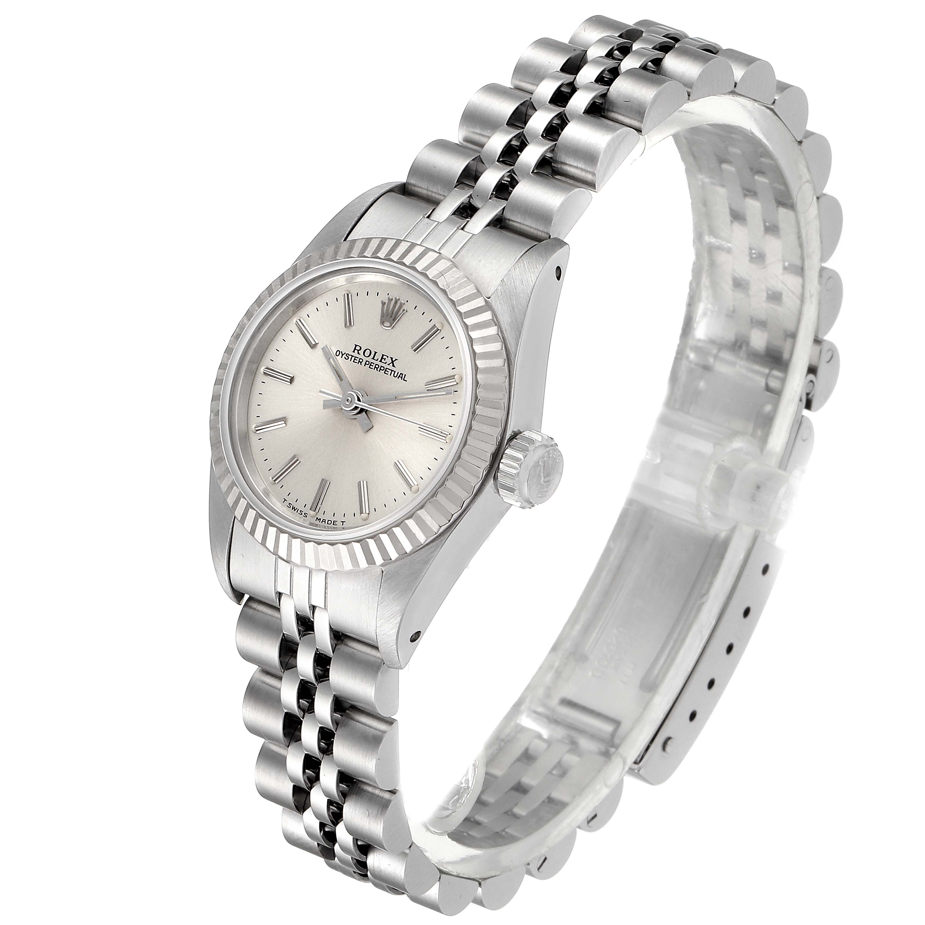 The image shows a side angle of a Rolex Oyster Perpetual 67194 Women's Stainless Steel Silver Dial 67194 Women's Stainless Steel Silver Dial watch featuring its face, bezel, crown, and bracelet.
