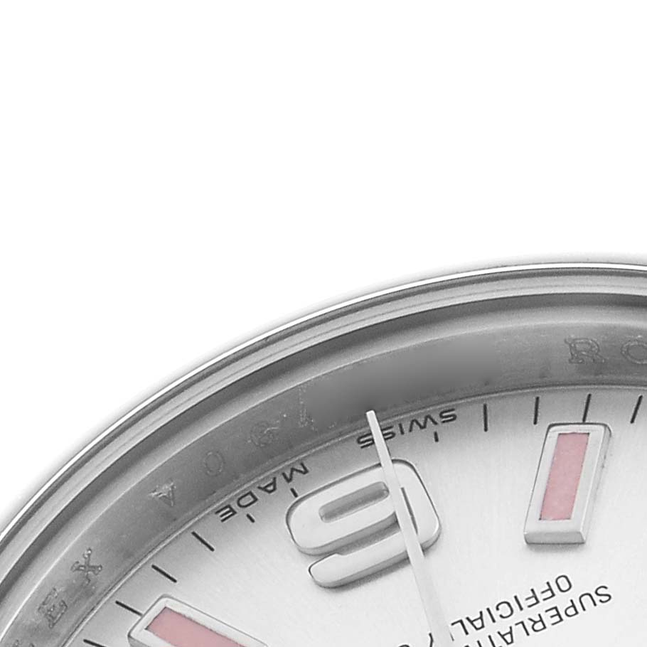 The image shows a partial view of the dial and bezel of a Rolex Oyster Perpetual 176200 Men's Stainless Steel Silver Dial, focusing on the 9 o'clock position.