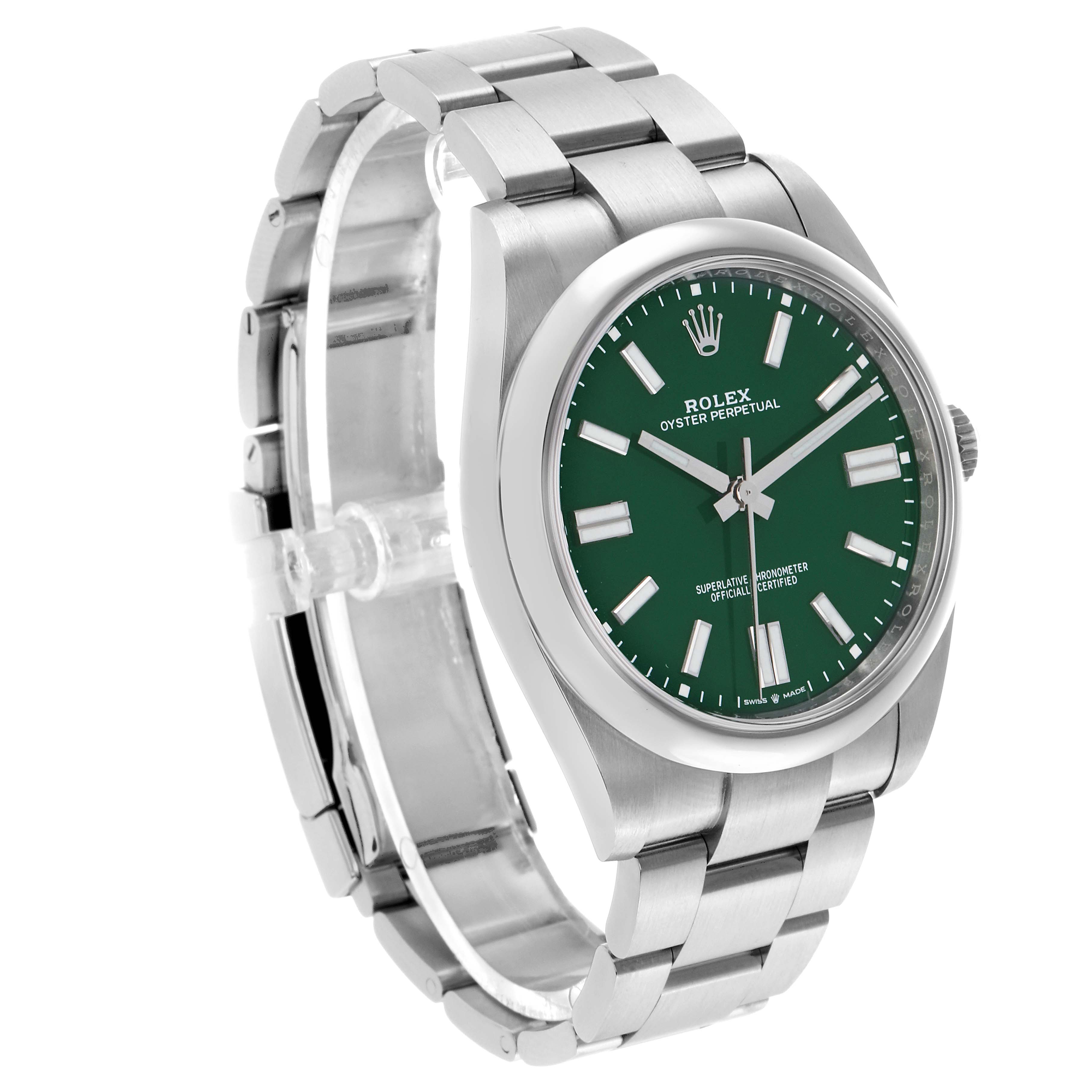The Rolex Oyster Perpetual 124300 Men's Stainless Steel Green Dial watch is shown at a three-quarter angle, displaying the green dial, bezel, crown, and part of the bracelet.