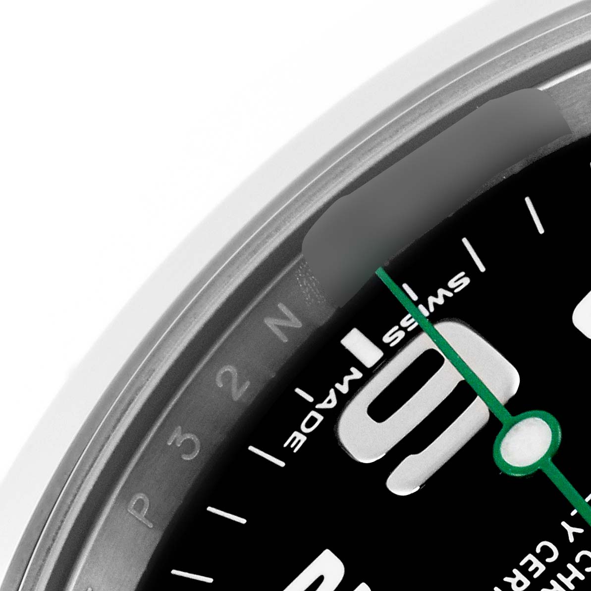 The image shows a close-up of the Rolex Air-King 116900 Men's Stainless Steel Black Dial 116900 Men's Stainless Steel Black Dial watch dial focusing on the edge, number indices, and green seconds hand.