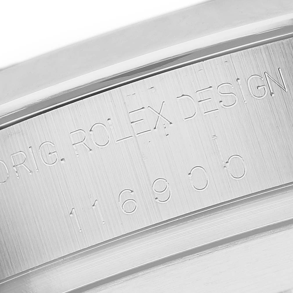 The image shows a close-up of the Rolex Air-King 116900 Men's Stainless Steel Black Dial 116900 Men's Stainless Steel Black Dial's engraved case side.