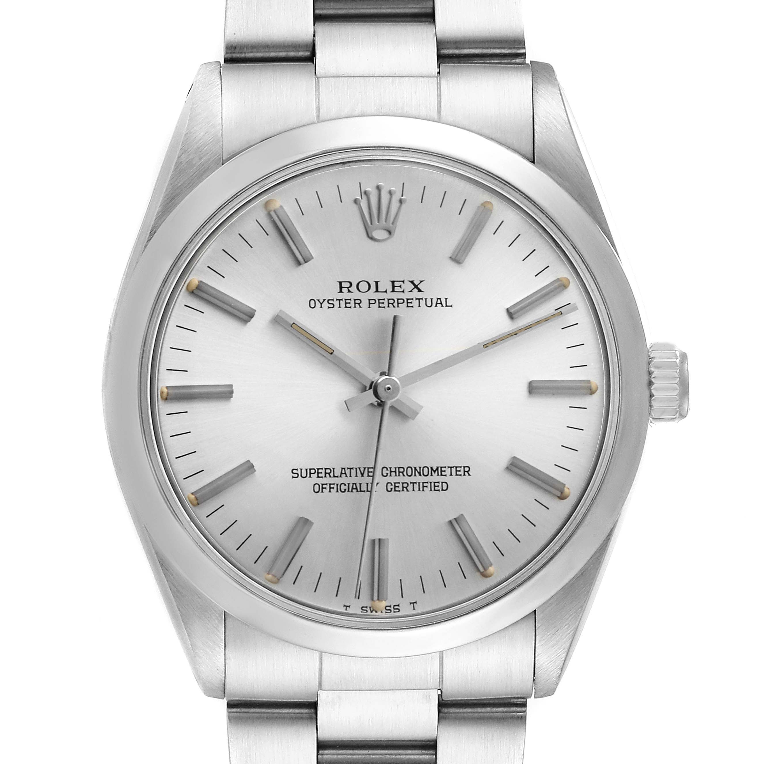 The Rolex Oyster Perpetual 1002 Men's Stainless Steel Silver Dial is shown from a front angle, highlighting its dial, hands, crown, and part of the bracelet.