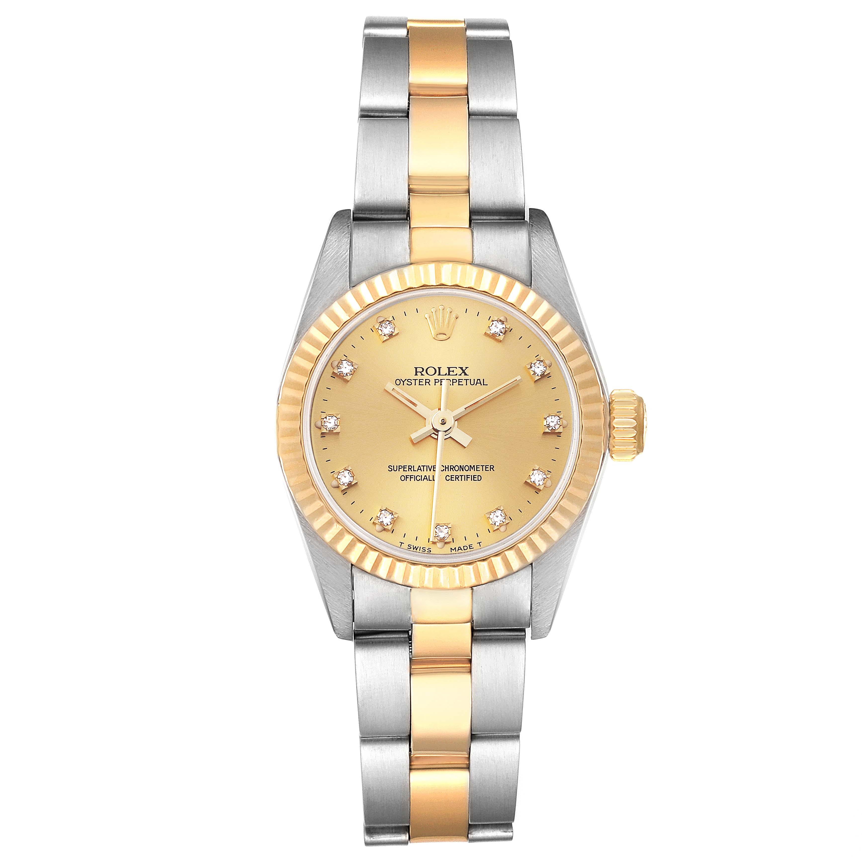 The image shows a frontal view of a Rolex Oyster Perpetual 67193 Women's Steel and Gold (two tone) Champagne Dial 67193 Women's Steel and Gold (two tone) Champagne Dial watch, featuring a two-tone bracelet and gold dial with diamond markers.