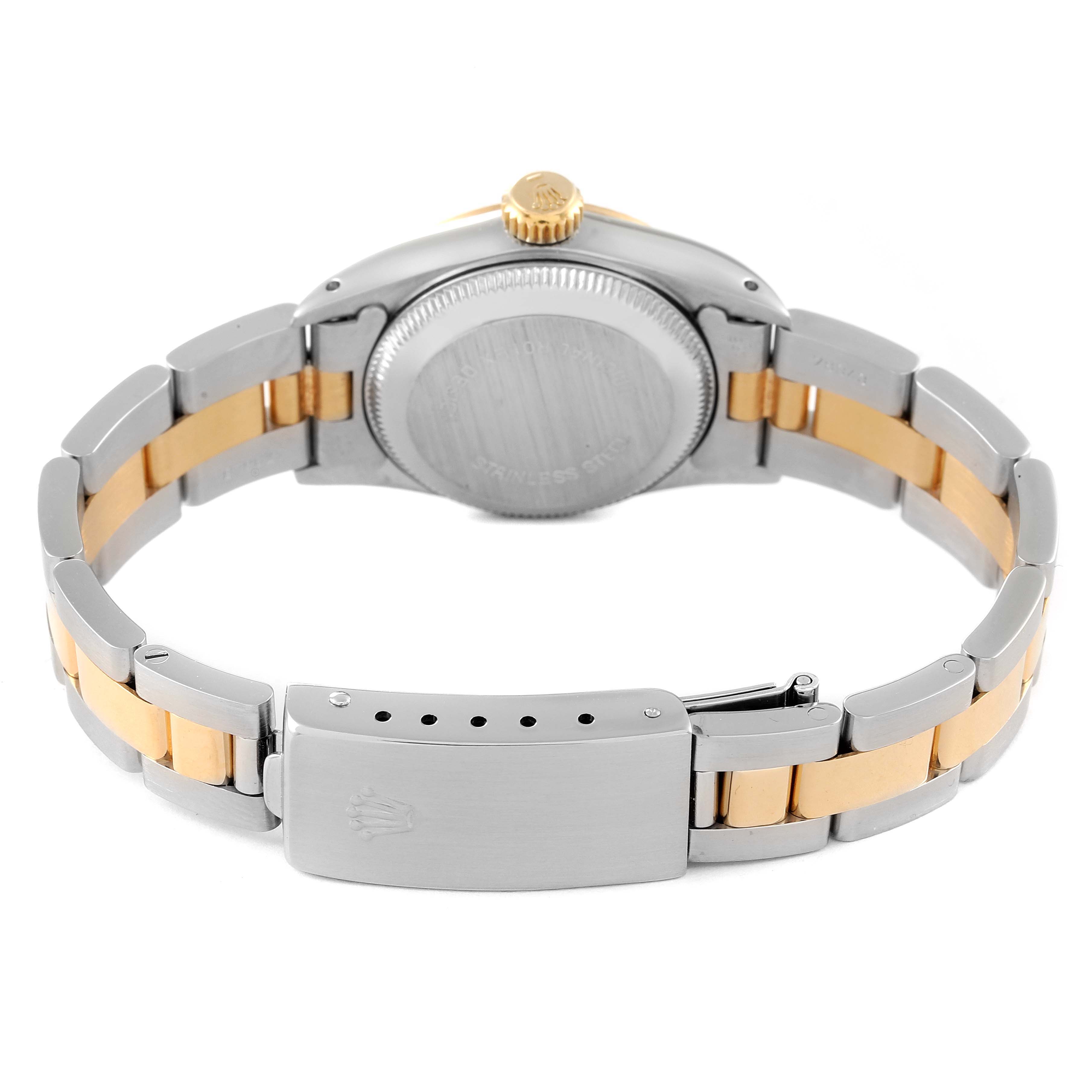 This image shows the back view of a Rolex Oyster Perpetual 67193 Women's Steel and Gold (two tone) Champagne Dial 67193 Women's Steel and Gold (two tone) Champagne Dial watch, highlighting the case back, bracelet, and clasp.
