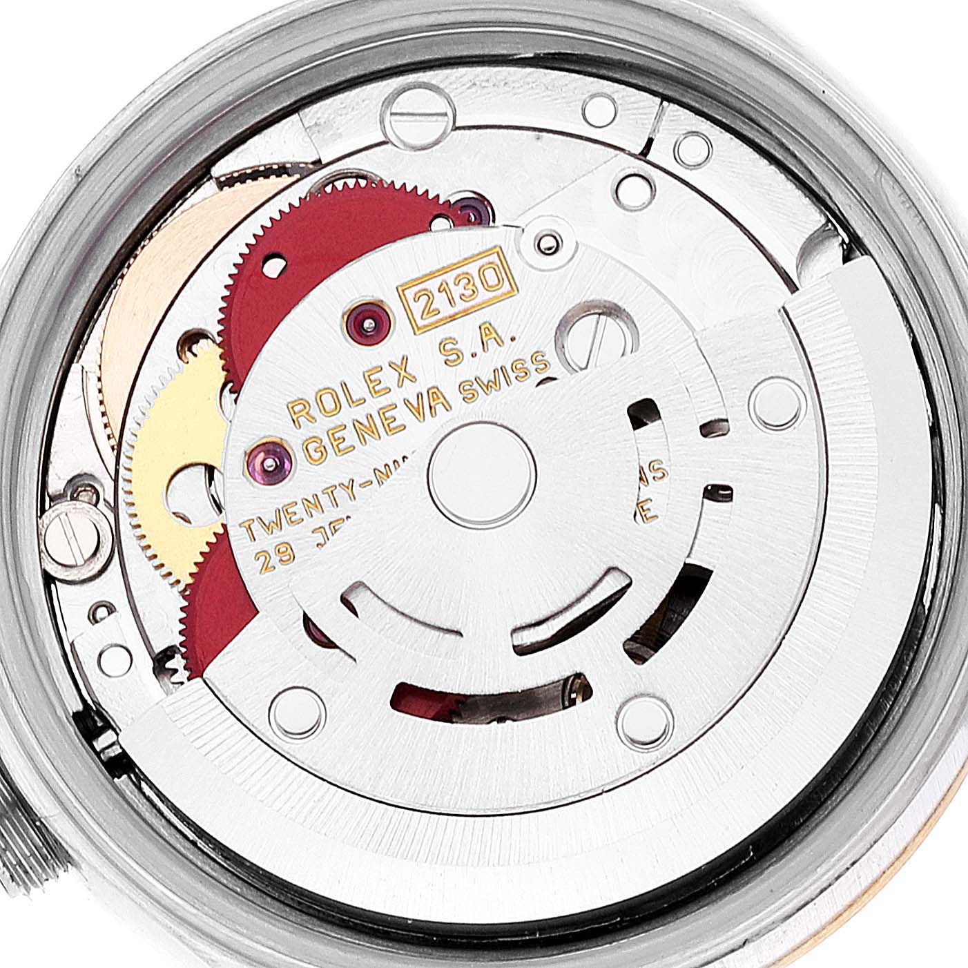 The image shows a close-up view of the Rolex Oyster Perpetual 67193 Women's Steel and Gold (two tone) Champagne Dial 67193 Women's Steel and Gold (two tone) Champagne Dial's internal movement mechanism.