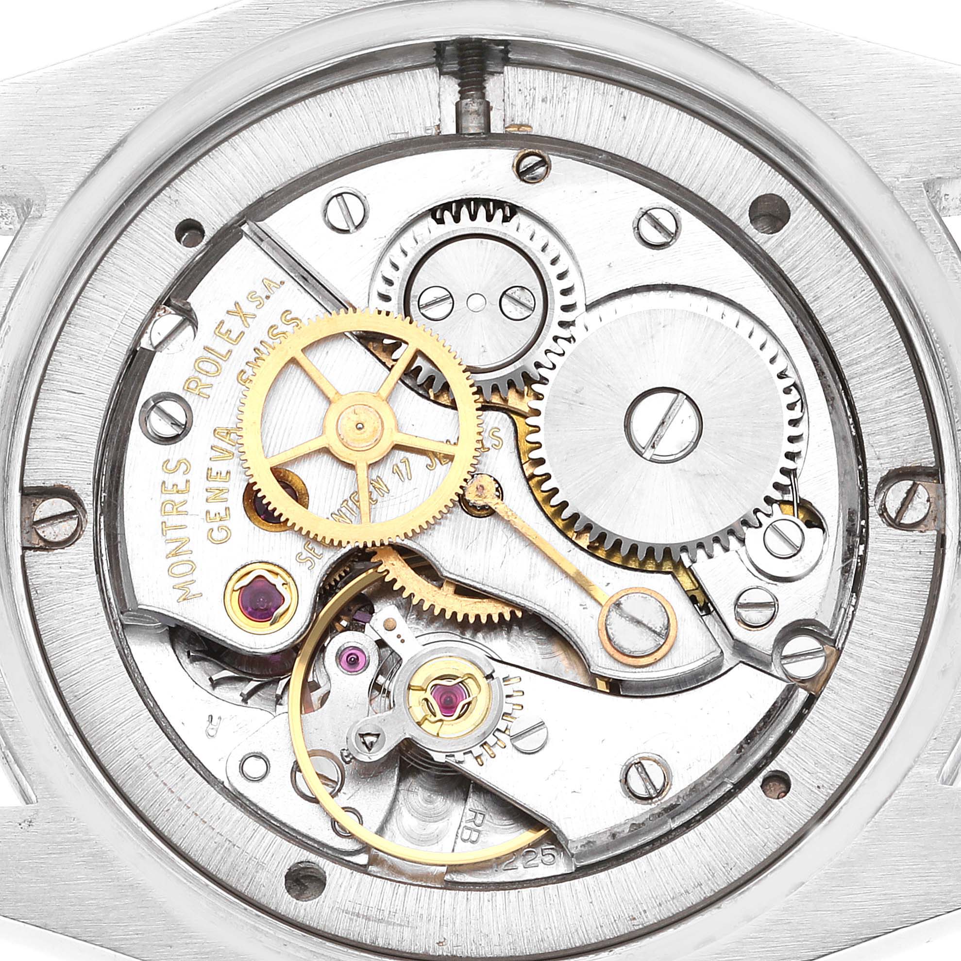 This image shows the internal movement mechanism of a Vintage Collection Rolex watch, viewed from the back.