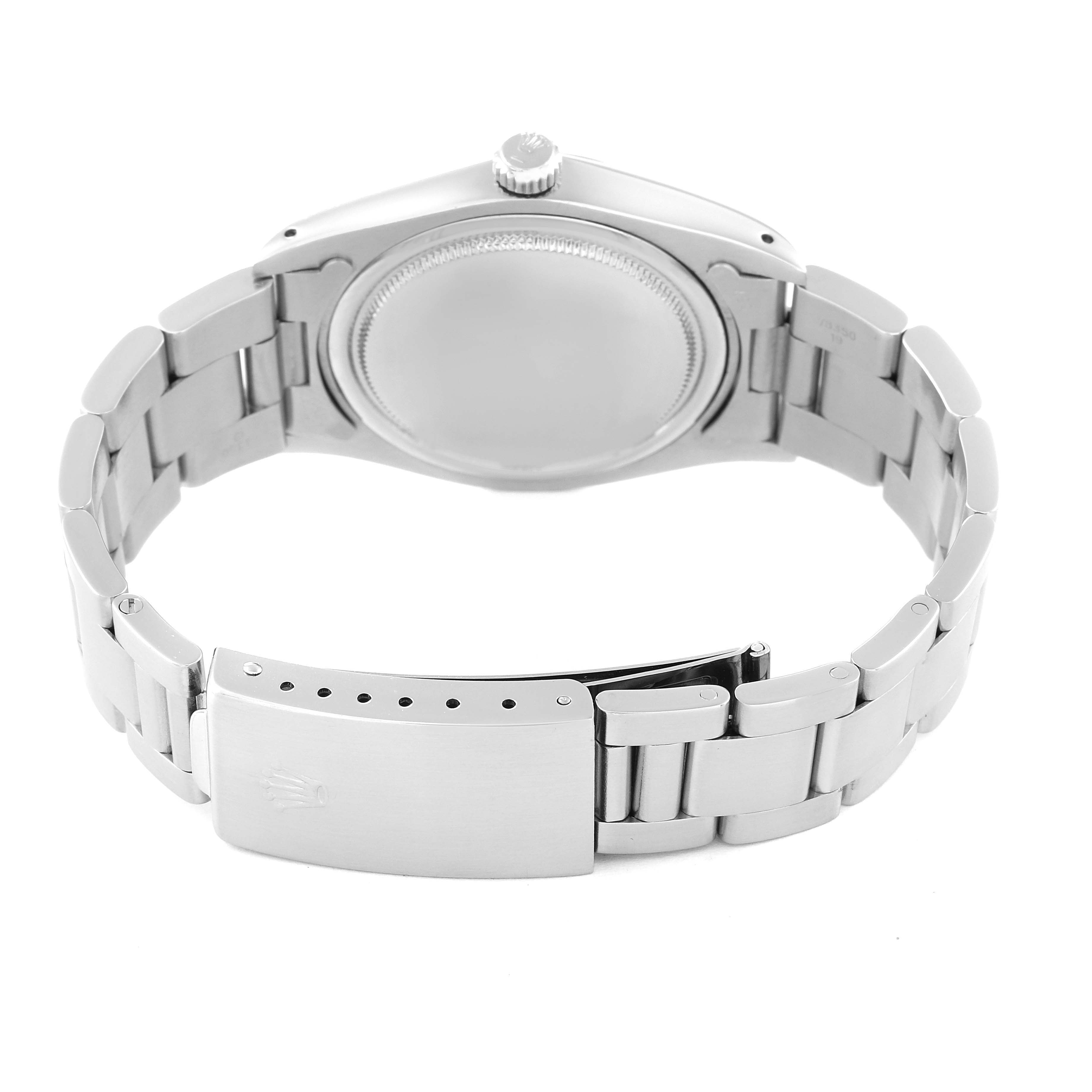 The image shows the back view of a Rolex Vintage Collection 6694 Men's Stainless Steel Brown Dial 6694 Men's Stainless Steel Brown Dial watch, highlighting the case back and the bracelet with the clasp open.