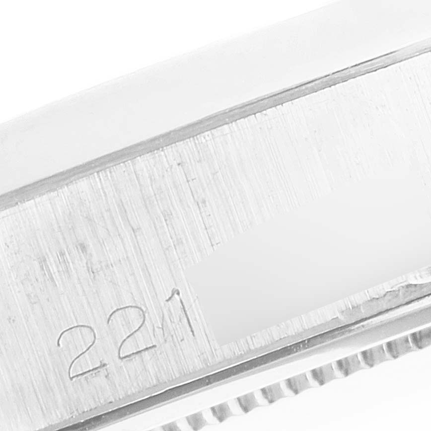 This close-up image shows the engraved serial number on the case of a Rolex Vintage Collection 6694 Men
s Stainless Steel Silver Dial 6694 Men
s Stainless Steel Silver Dial watch.