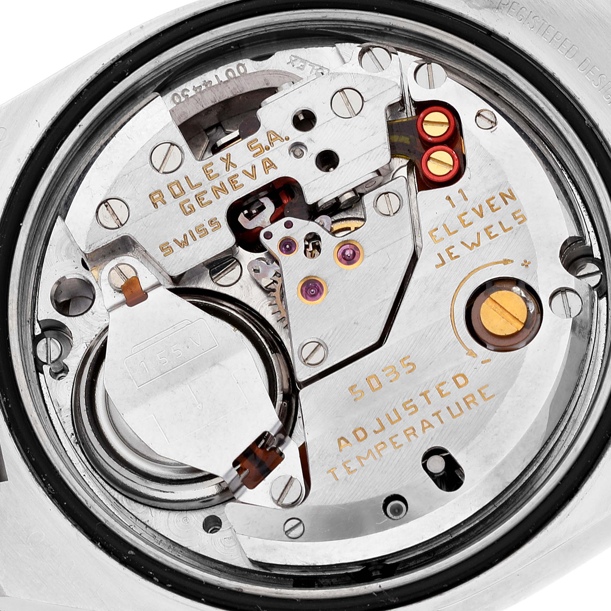 The image shows the internal mechanism of a Rolex Oysterquartz 17000 Men's Stainless Steel Silver Dial 17000 Men's Stainless Steel Silver Dial watch at a close-up angle, highlighting the components and inscriptions.