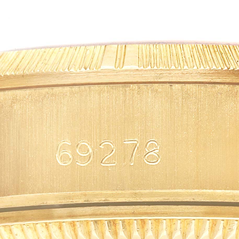 The image shows the engraved reference number on the side of the bezel for the Rolex President 69278 Women's Yellow Gold Champagne Dial 69278 Women's Yellow Gold Champagne Dial model.