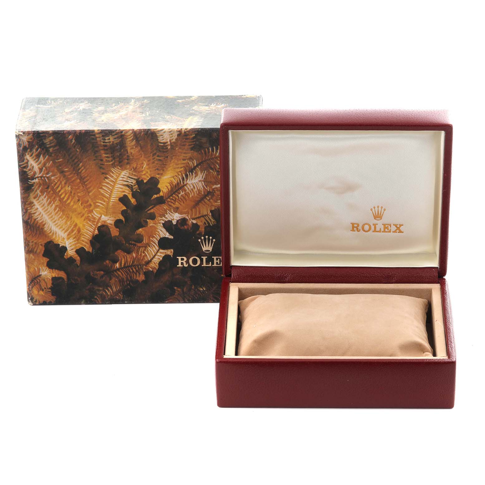 The image shows an open Rolex watch box and outer packaging for the President model, without the watch inside.