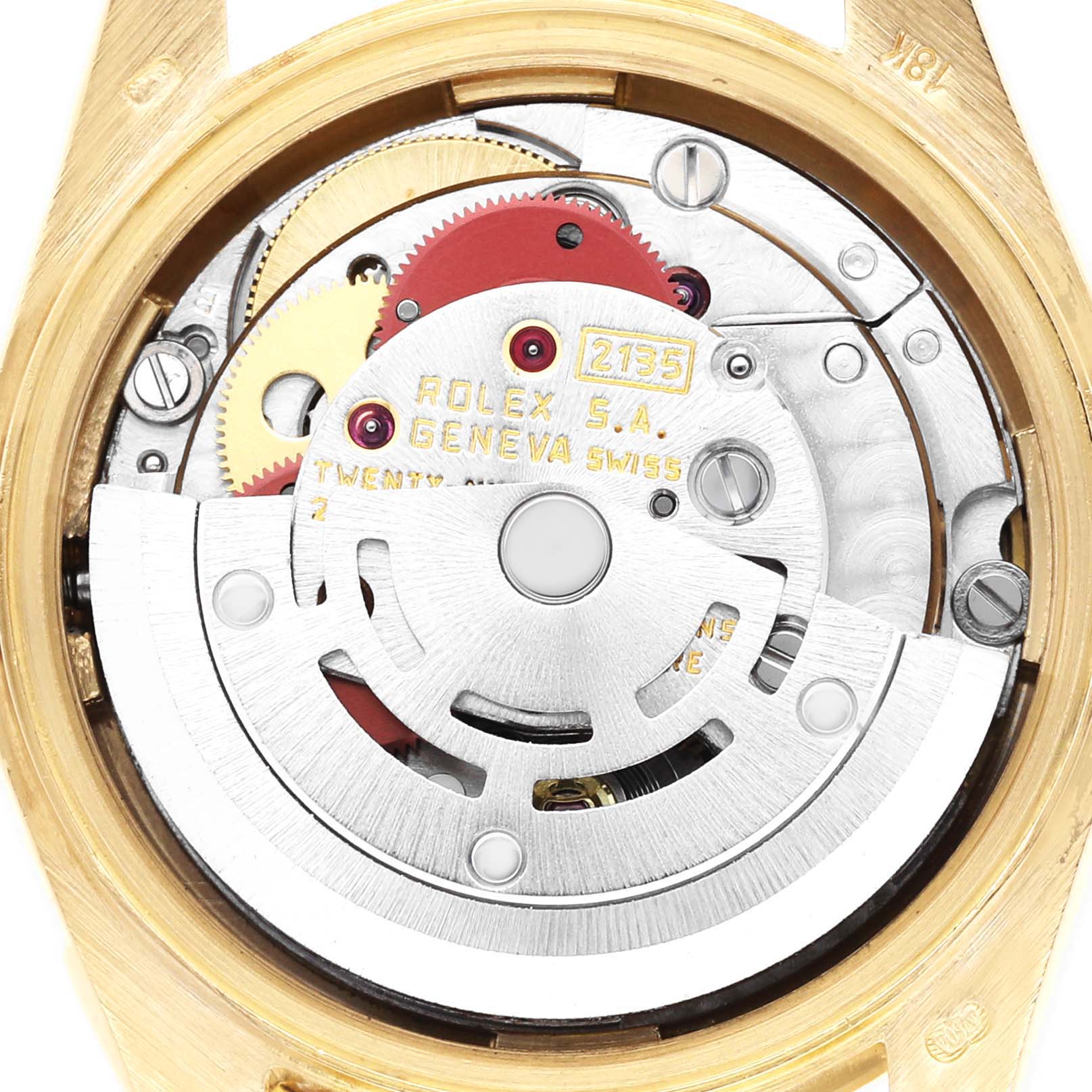The image shows the movement of a Rolex President 69138 Women's Yellow Gold Champagne Dial 69138 Women's Yellow Gold Champagne Dial model watch from the back, highlighting gears and mechanical components.