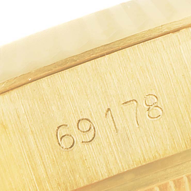 This is a close-up of the serial number engraved on the Rolex President 69178 Women
s Yellow Gold Champagne Dial 69178 Women
s Yellow Gold Champagne Dial model watch.