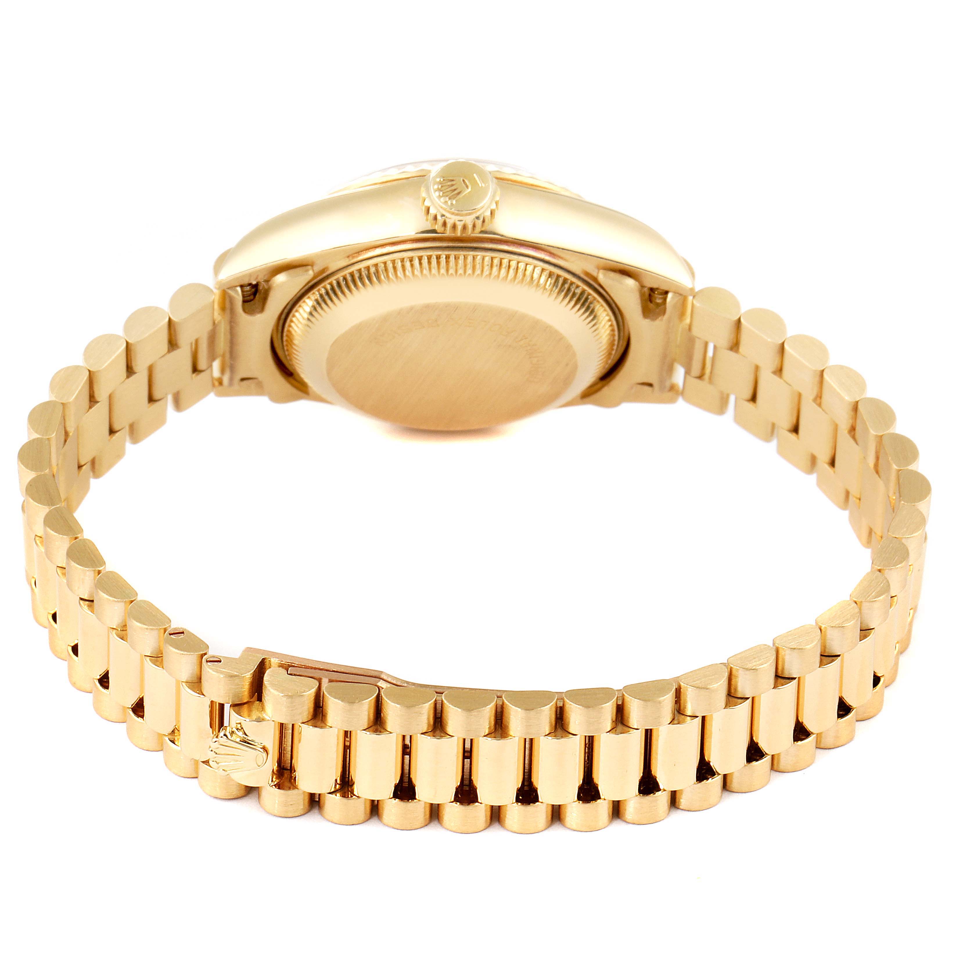 The image shows the back and bracelet of a gold Rolex President 69178 Women
s Yellow Gold Champagne Dial 69178 Women
s Yellow Gold Champagne Dial model watch.