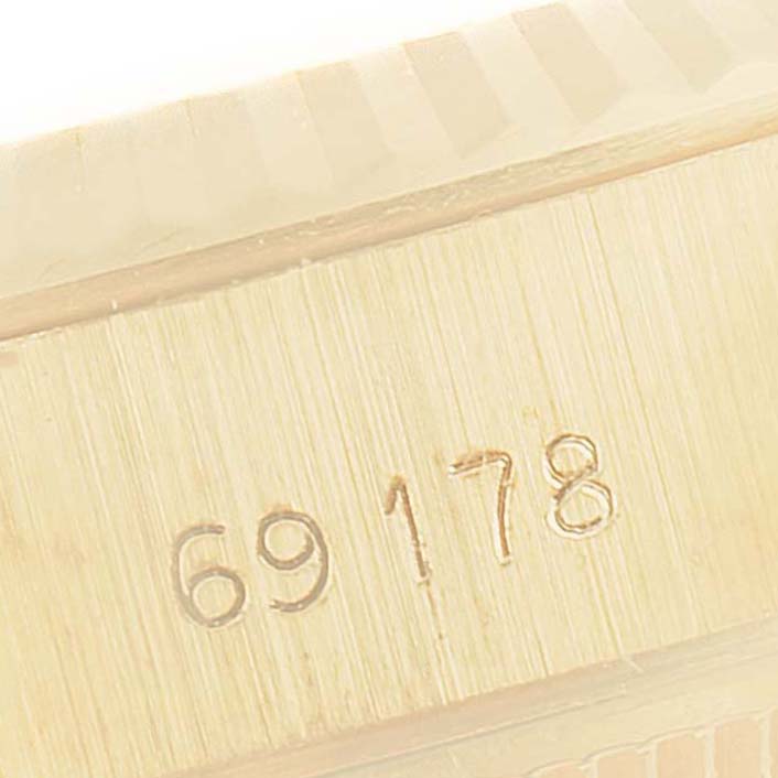 The image shows a close-up, angled view of the engraved number "69178" on the side of a Rolex President 69178 Women
s Yellow Gold Champagne Dial 69178 Women
s Yellow Gold Champagne Dial model watch.
