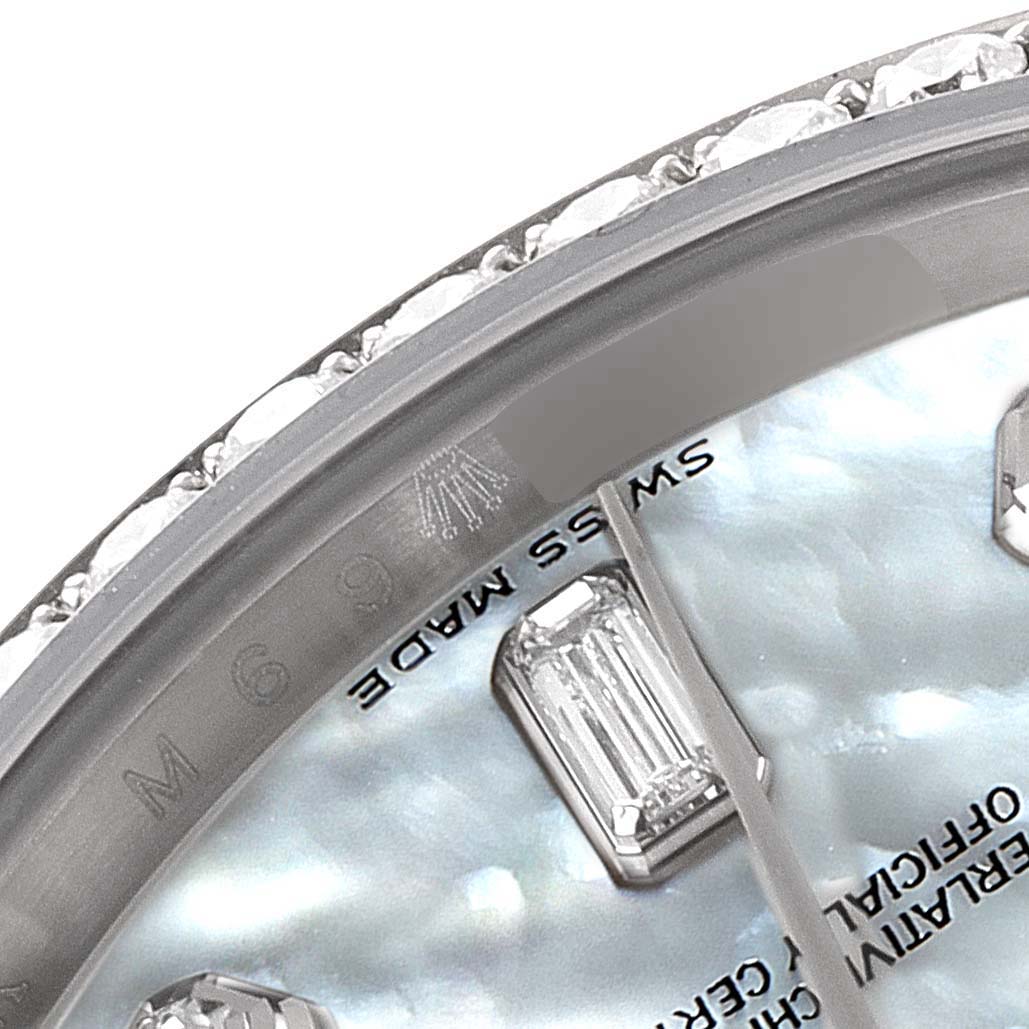 This close-up shows part of the dial, bezel, and diamond markers of the Rolex President 118389 Men's White Gold Mother of Pearl Dial 118389 Men's White Gold Mother of Pearl Dial model watch.