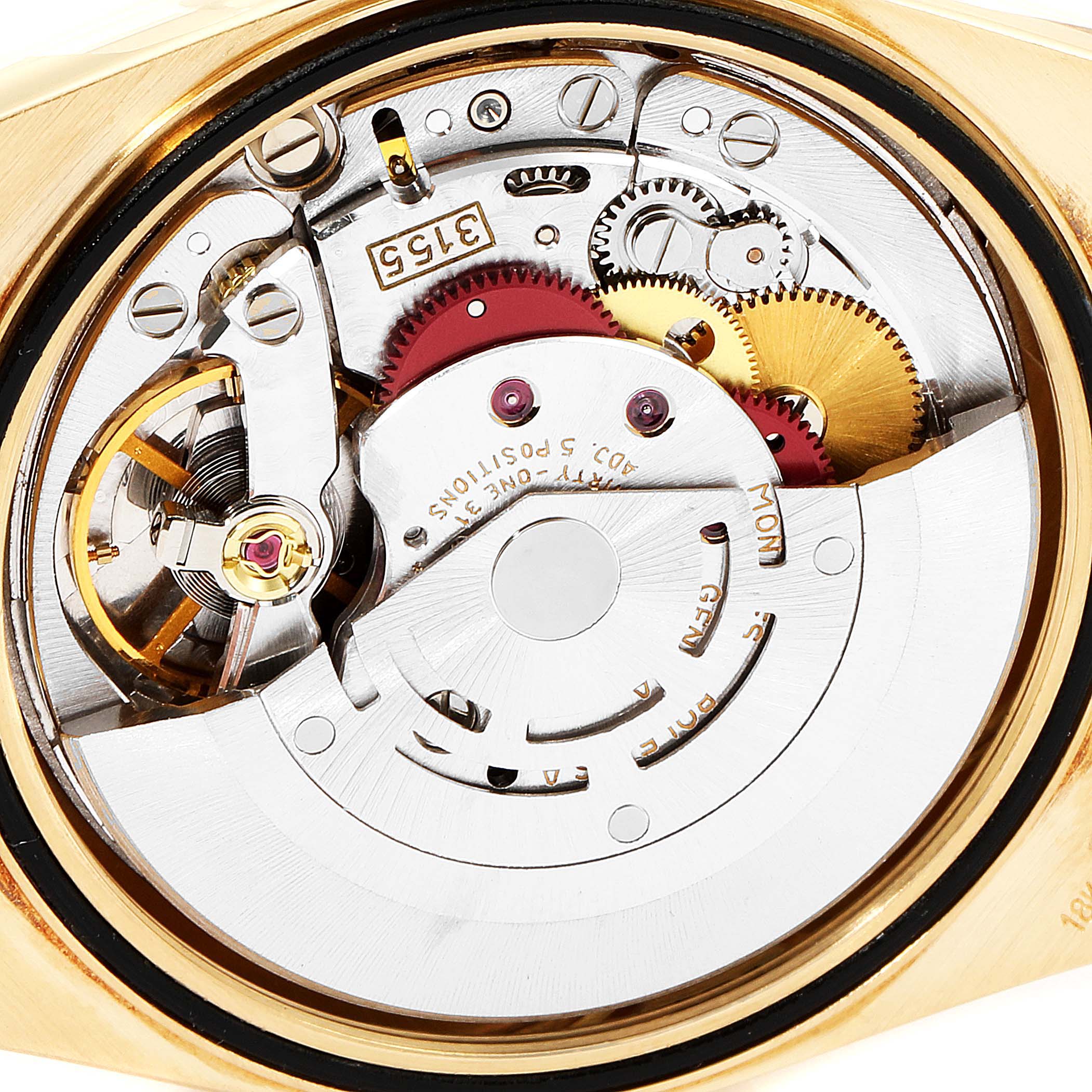The image shows the internal mechanical movement of a Rolex President 18238 Men
s Yellow Gold Champagne Dial 18238 Men
s Yellow Gold Champagne Dial model watch from a close-up, top-down angle.