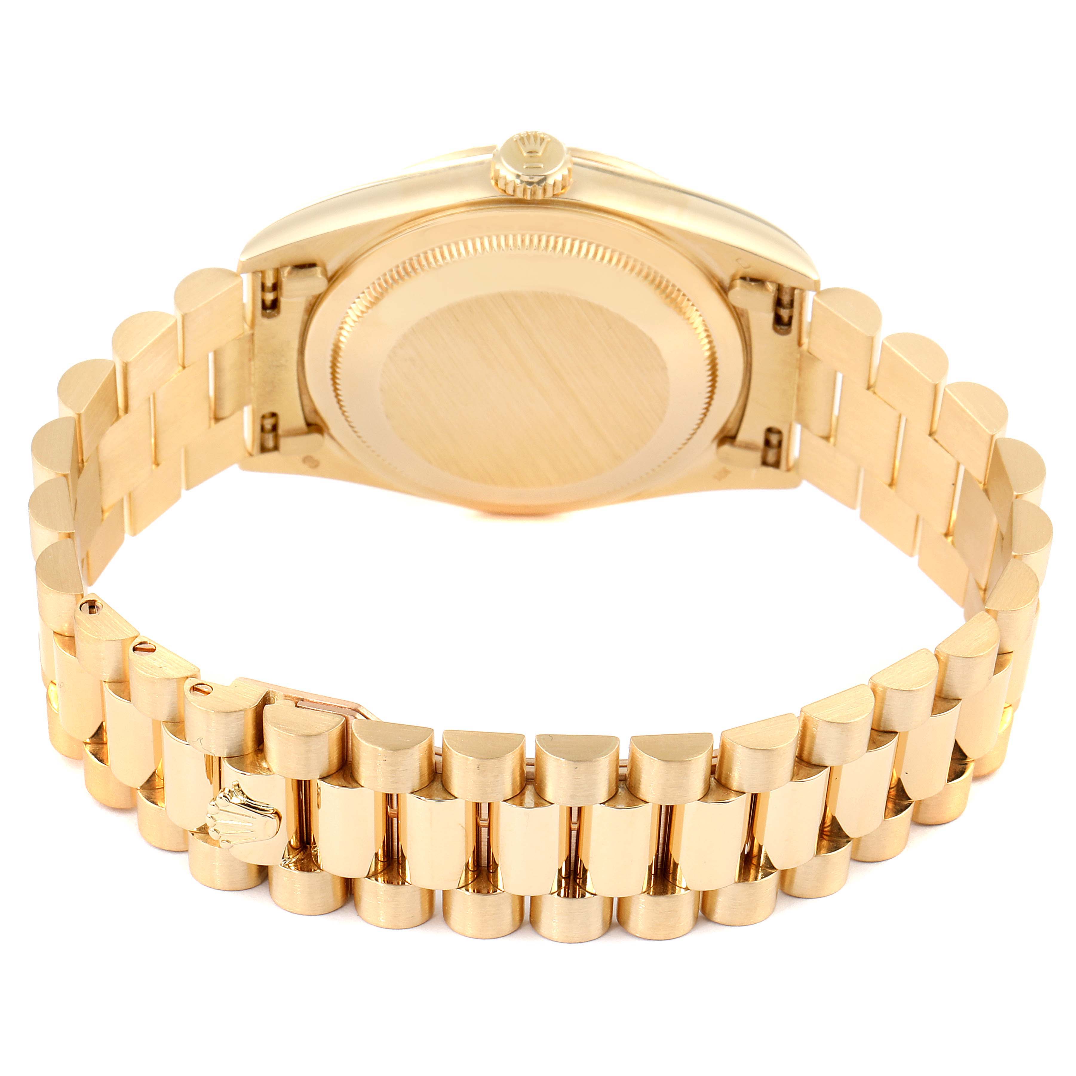 This image shows the backside and bracelet clasp of a Rolex President 18238 Men
s Yellow Gold Champagne Dial 18238 Men
s Yellow Gold Champagne Dial model watch, highlighting its gold finish and links.