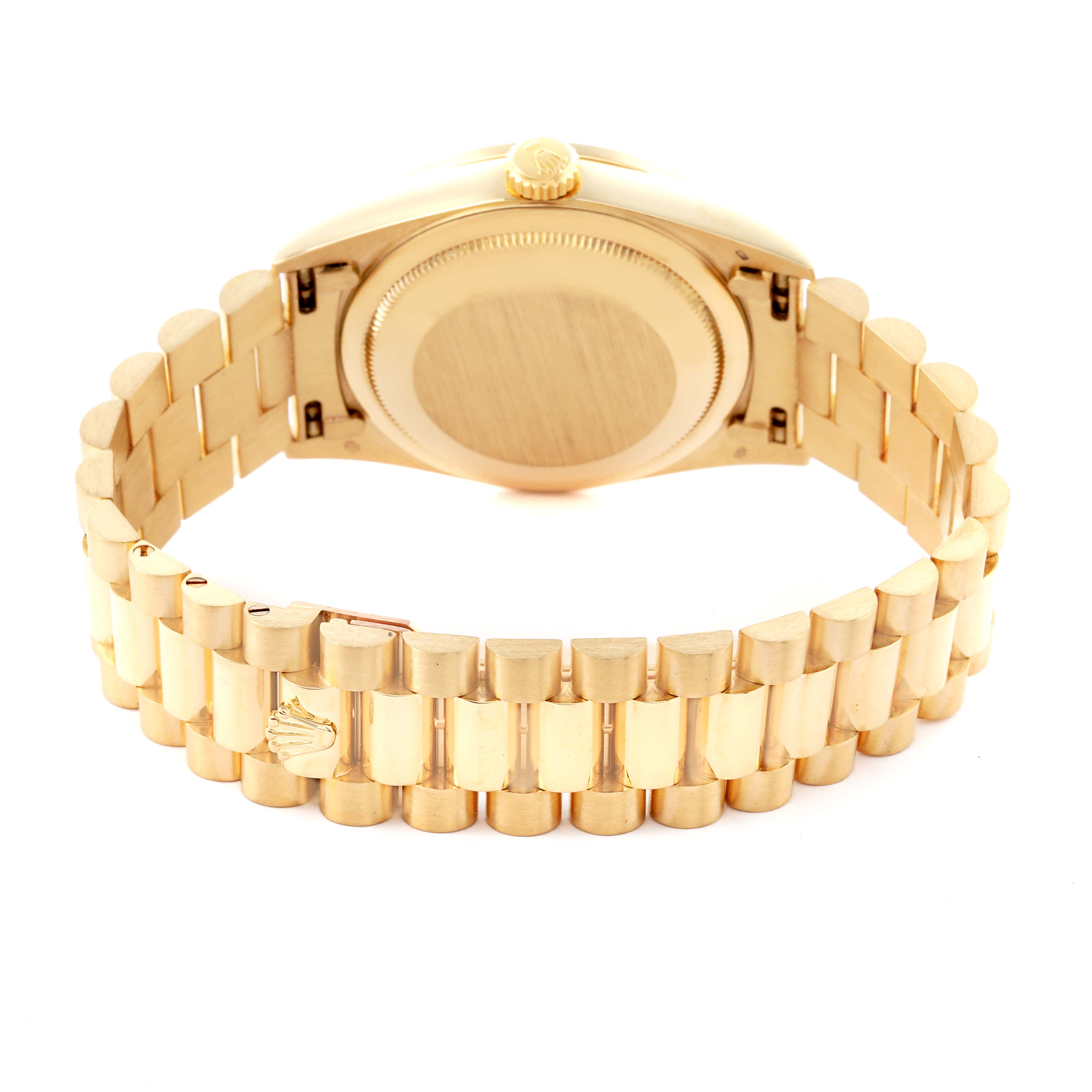 The Rolex President 18348 Men
s Yellow Gold Champagne Dial 18348 Men
s Yellow Gold Champagne Dial model watch is shown from the back, displaying the case and bracelet.
