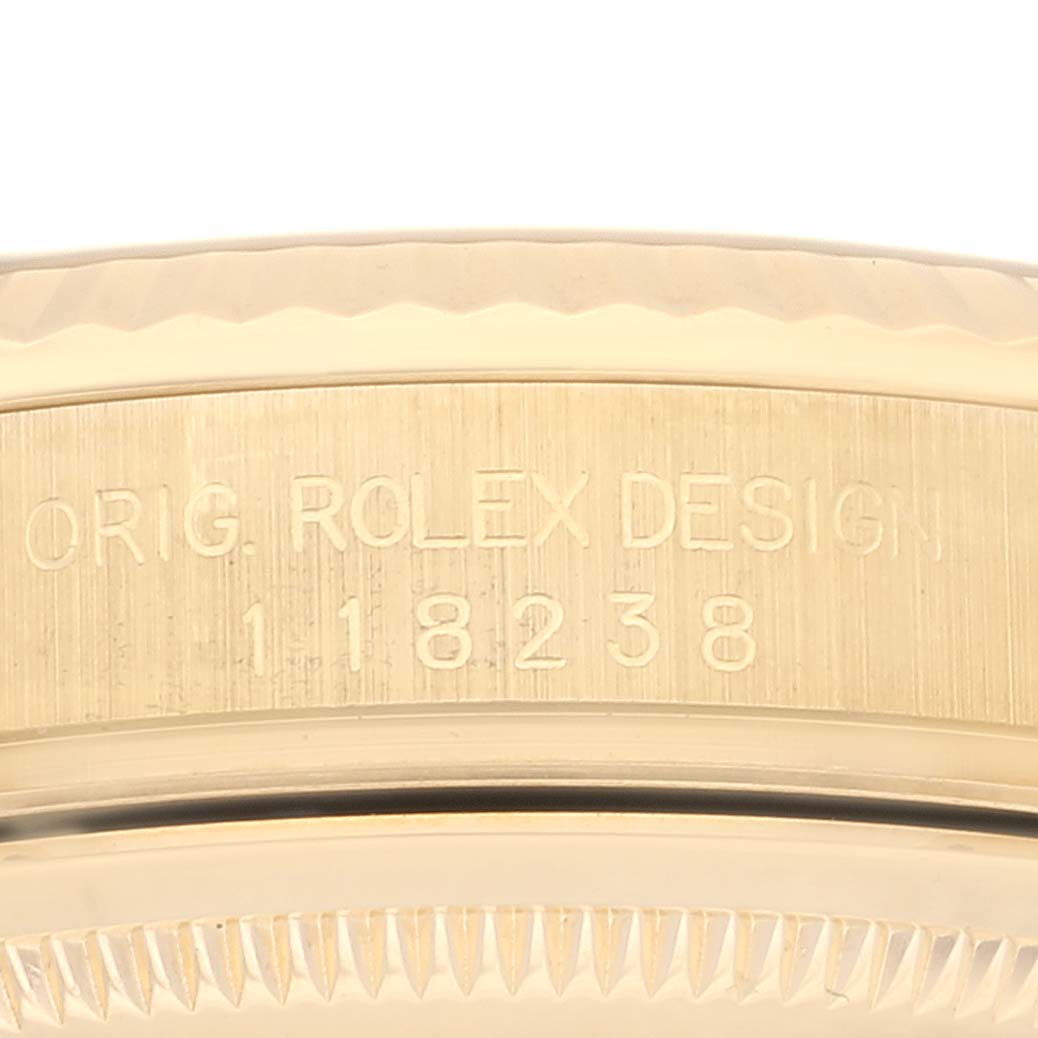 The image shows a close-up of the side of a Rolex President 118238 Men's Yellow Gold Green Dial 118238 Men's Yellow Gold Green Dial watch, displaying its model number "118238" and design details.