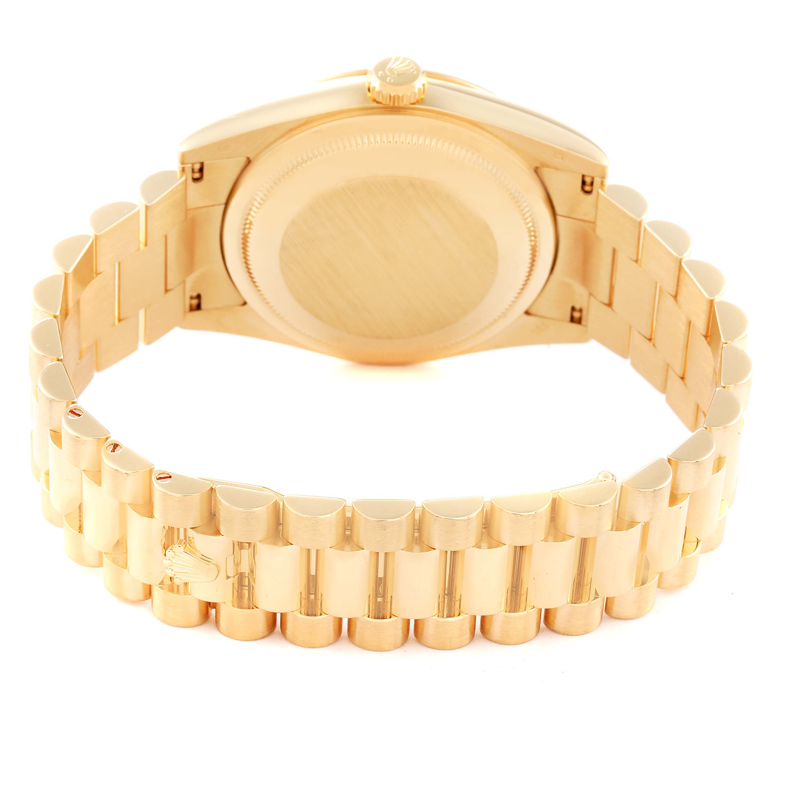 The image shows the case back and bracelet of the Rolex President 118238 Men's Yellow Gold Green Dial 118238 Men's Yellow Gold Green Dial model watch from a rear angle.