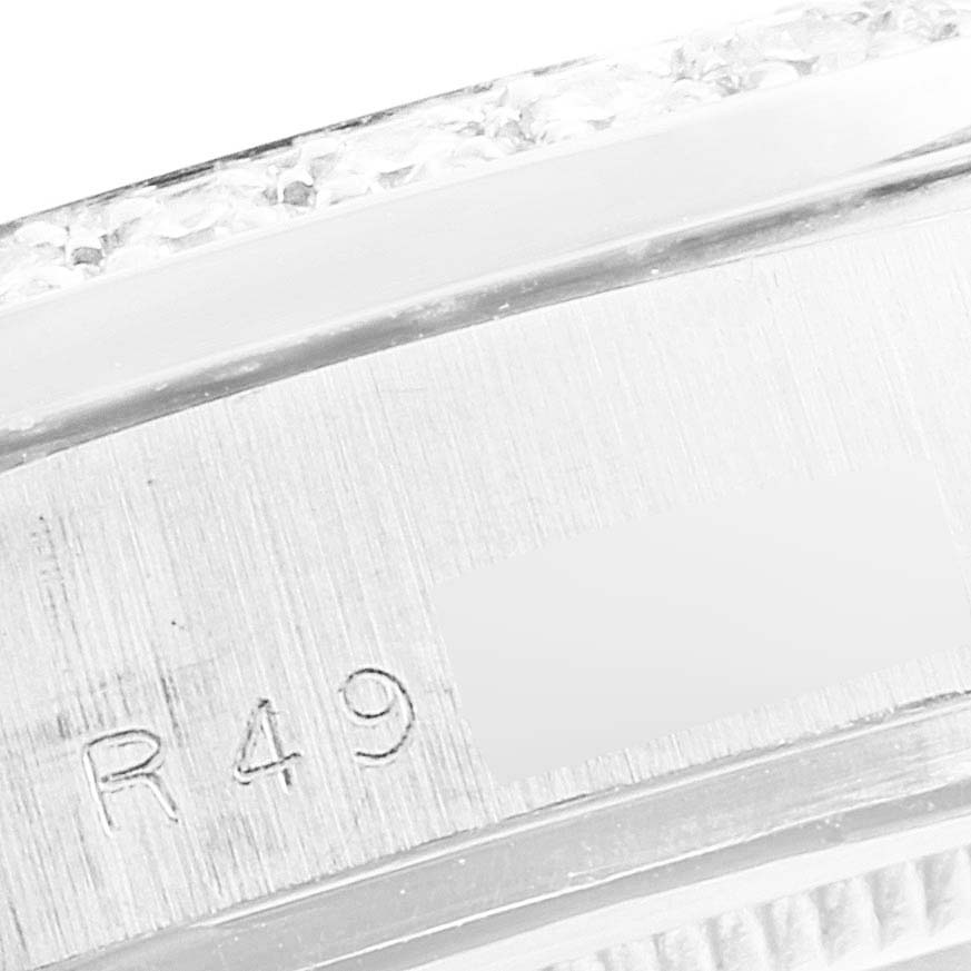 This image shows a close-up of the case side with engraved details on the Rolex President 18046 Men's Platinum Silver Dial 18046 Men's Platinum Silver Dial model watch.