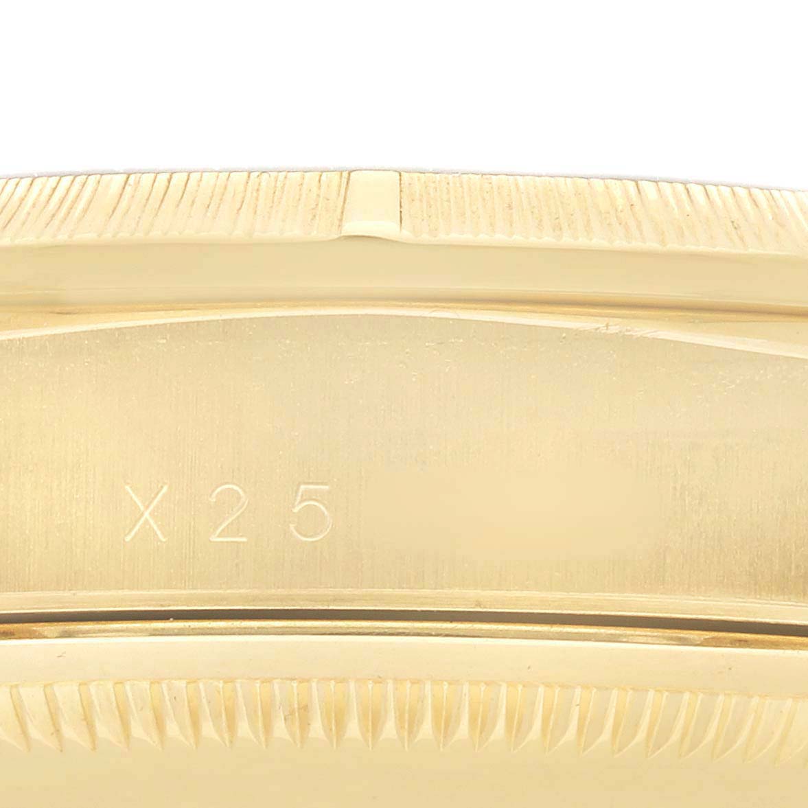 The image shows a close-up of the side of a Rolex President 18248 Men's Yellow Gold Champagne Dial watch, focusing on the case with visible markings.
