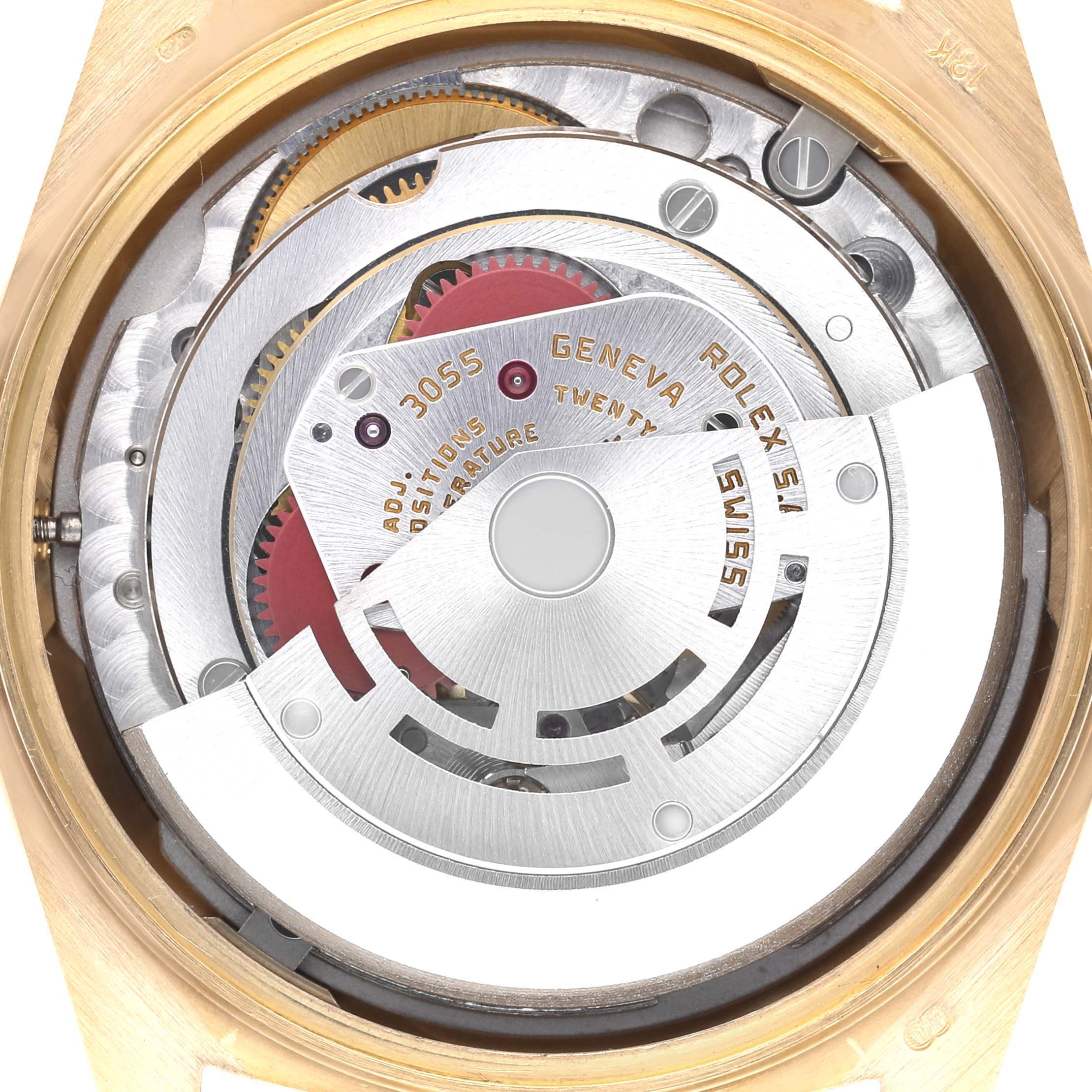 This image shows a close-up of the movement inside the Rolex President 18078 Men
s Yellow Gold Champagne Dial 18078 Men
s Yellow Gold Champagne Dial model, highlighting its intricate mechanics.