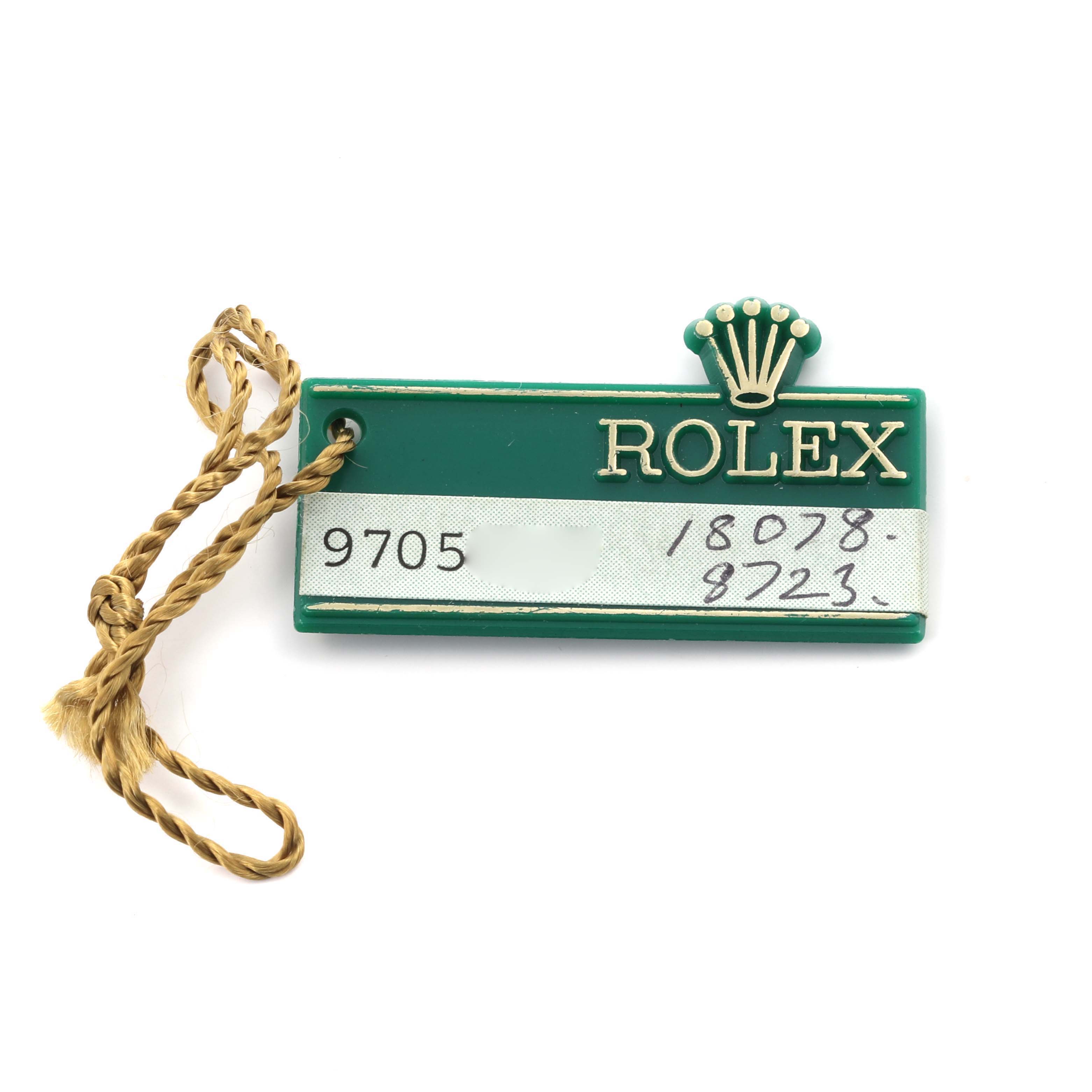 The image shows a green Rolex tag with a string, featuring the brand name and model numbers for the Rolex President 18078 Men
s Yellow Gold Champagne Dial watch.