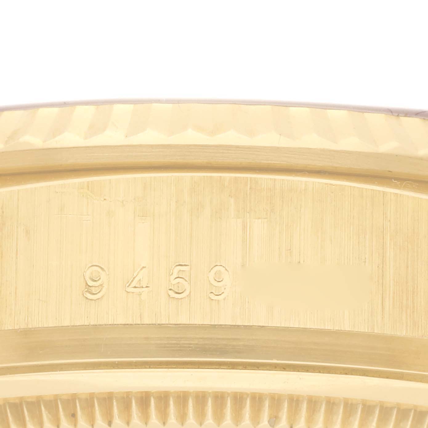The image shows a close-up of the case back with engravings from the Rolex President 18038 Men's Yellow Gold Champagne Dial 18038 Men's Yellow Gold Champagne Dial model.