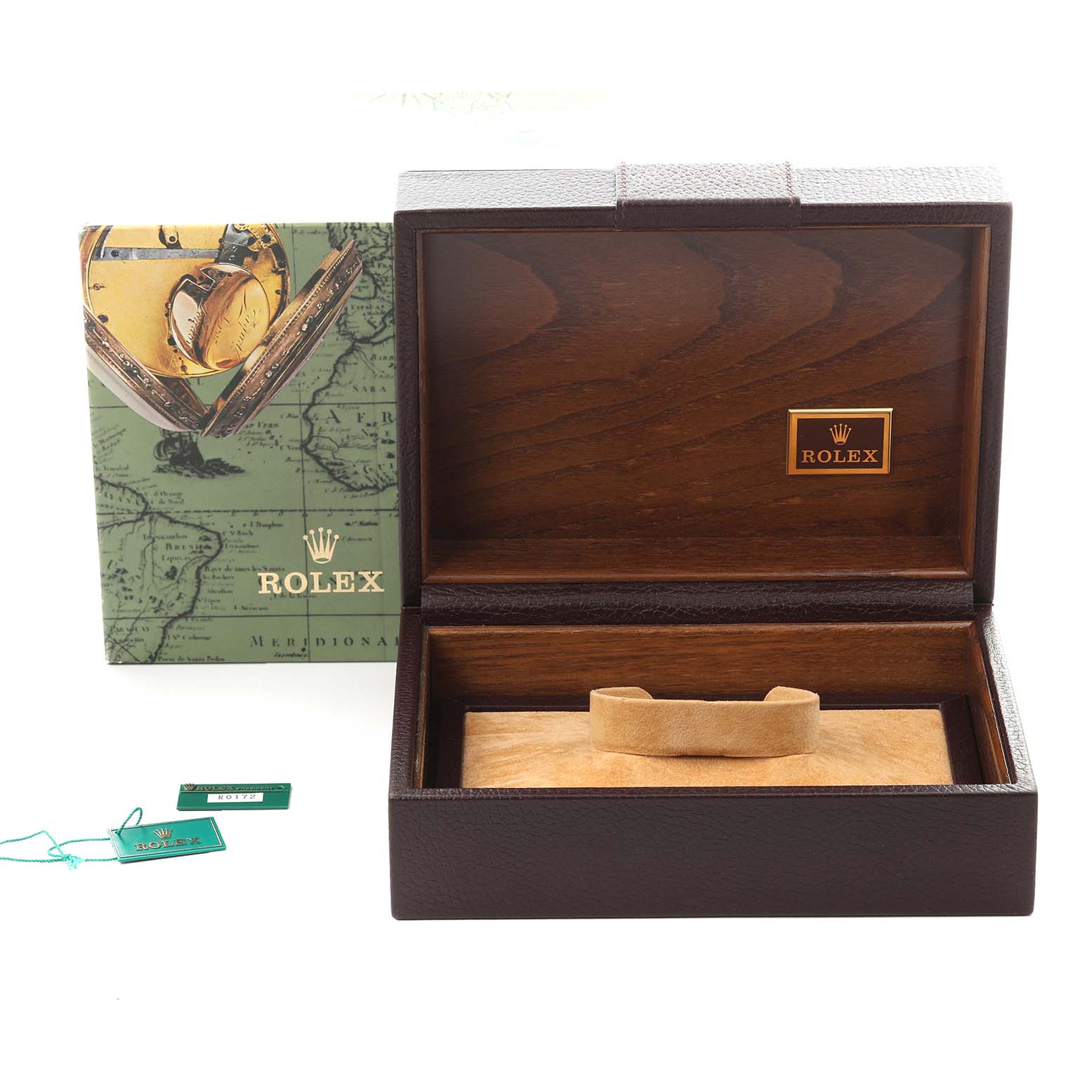 The image shows the packaging and accessories of a Rolex Datejust, including the box, booklet, and tags, from an overhead angle.